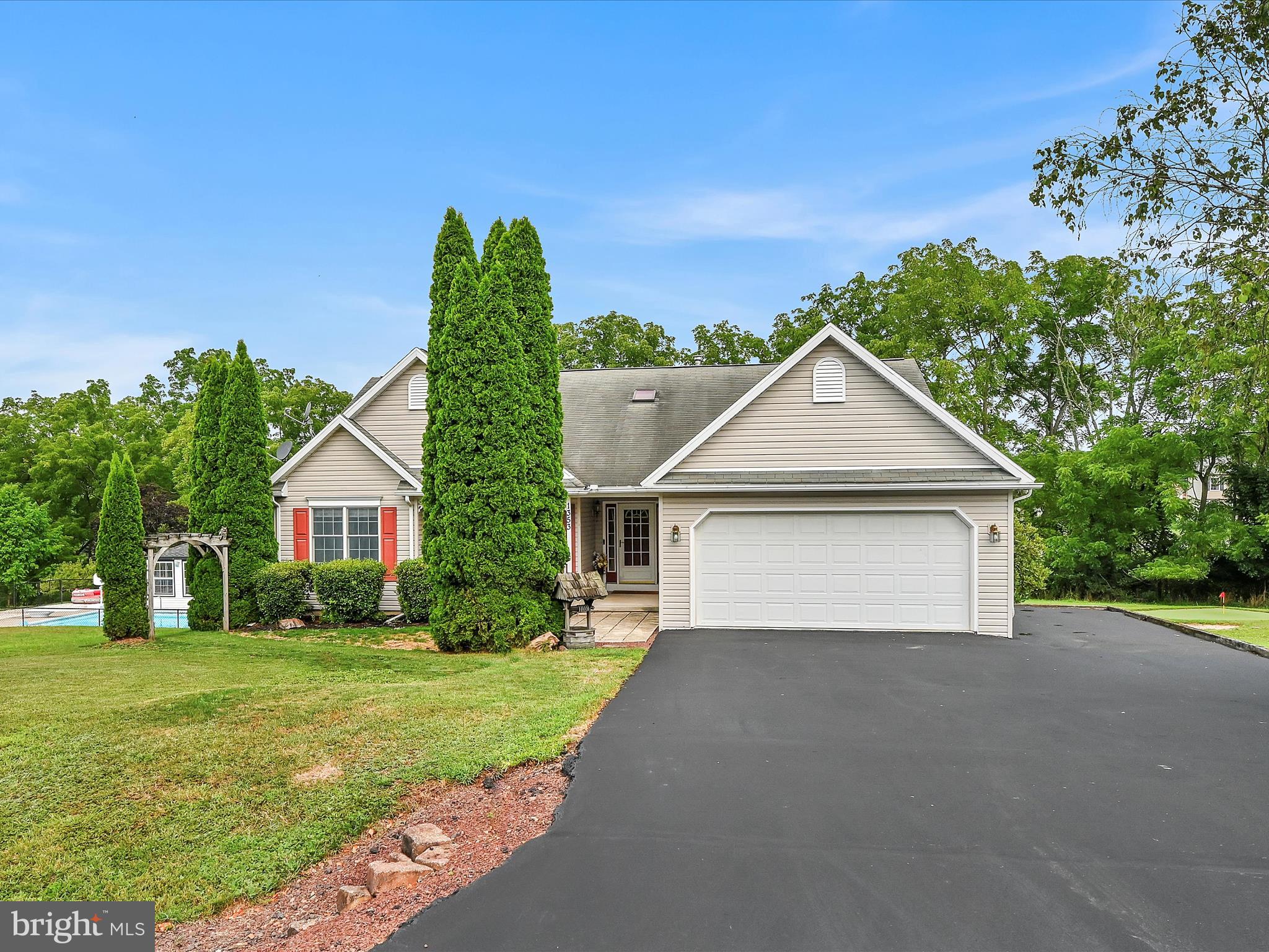Welcome Home to this perfectly located, 5 Bedroom, 3 Bath, Ranch home, situated on a Combined 0.90 acres in Lake Wynonah!! This home features Main level, one floor living, but the Basement has Sooo much MORE to offer!! Upon entering the home's front door, you're welcomed into the home's traditional living room, that is fully equipped with a wood-burning fireplace, and a wet bar!! If you choose to enter the home from the Attached, 2 car garage, you would enter into the home's kitchen, accompanied by the formal dining room! The First floor living is completed by 2 bedrooms & a full bathroom, Plus the Master Bedroom, which features and additional sitting area/office area, propane fireplace, whirlpool bathtub, shower, and large walk-in closet! Bedrooms and Bathrooms have NEW, Updated flooring!! The lower level of the home is a Must See!! Fully finished, and fully equipped with 2 additional bedrooms, 1 full bathroom, workout area or office area, family room area, AND, an Entertainment area featuring a pool table, and a custom built full bar!!!
The Entertaining doesn't Stop inside of the home!!! This home also features a large deck off of the rear of the home, that can host many bbq's, evening outings, or just another relaxful view! The Included lot/parcel to the right of the home, features a chip & putt area, fully equipped with a sand trap too, and a large shed in the rear corner. But WAIT, there's more!! Last, but certainly not Least, the additional lot/parcel to the left of the home, features your very own, In Ground, Heated pool!! The pool area has walk-out access from the Rec Room/Bar area of the home, and also an exterior gate. The pool area has it's very own pool house with changing area, plenty of room for countless chairs, and an outdoor fire pit area too!!
This home has NEVER been for sale before!!! Custom built in 1999, this home has been with it's original owners the entire time!! Here's your chance to be the First person to Purchase this home, and own one of Lake Wynonah's FINEST!! Don't wait, call and/or schedule your showings today!!