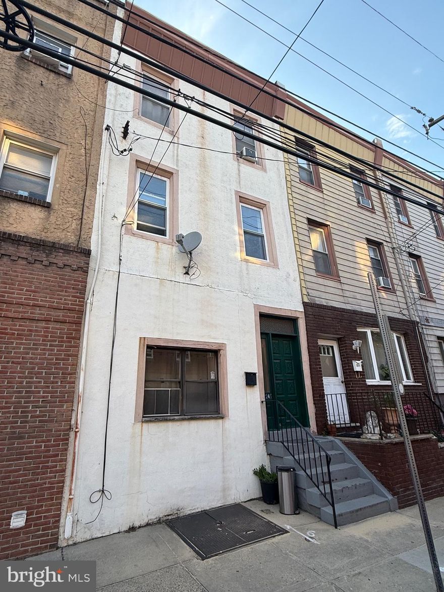 Very well cared for, 3 unit, triplex. Two, 1 bedroom units, and a 3rd floor efficiency unit. Located at 15th & wolf in the Marconi section of South Philadelphia.  This property is completely turned key, and the second and third floor leases are on month-to-month status.  The first floor is leased until December. These property  has a fantastic rental history. Do not ignore this investment opportunity.