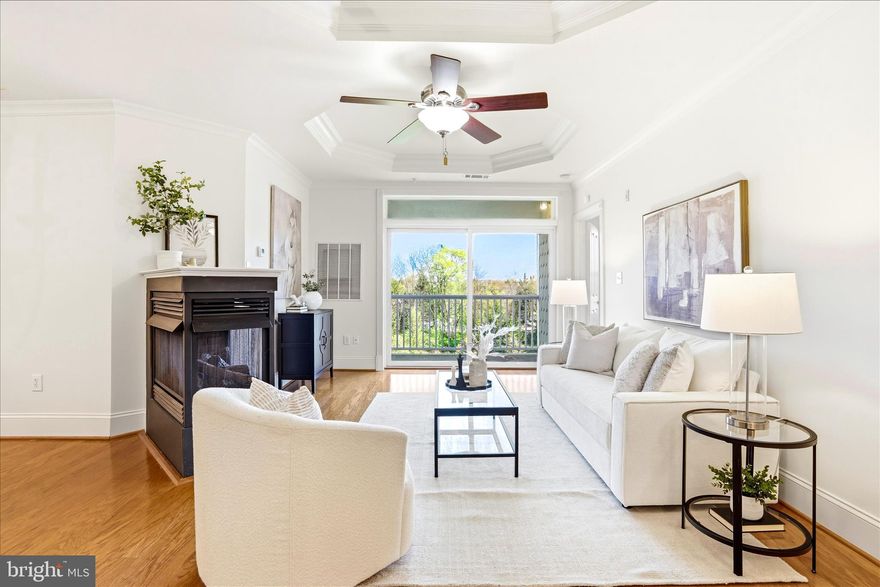 Experience premier top-floor living in this meticulously updated 3-bedroom, 2.5-bathroom condo, where expansive views of Frederick’s rolling hills meet a spacious open floor plan. Completely move-in ready, the home features elegant tray ceilings, fresh paint on all walls and ceilings, and refinished white semi-gloss cabinetry in both the kitchen and baths. The heart of the home is an open living area anchored by a multi-sided gas fireplace and an eat-in kitchen boasting a pantry and a full suite of brand-new appliances (Nov 2025). Total peace of mind is ensured with brand-new carpeting in the hallway and bedrooms (Dec 2025), a new HVAC (2024), and a new hot water heater (2020). This unit includes a highly coveted assigned spot in the secure underground garage, dedicated storage units, and access to a peaceful shared resident patio and community amenities. Ideally located just minutes from major shopping, dining and commuter routes, this home is move-in ready!