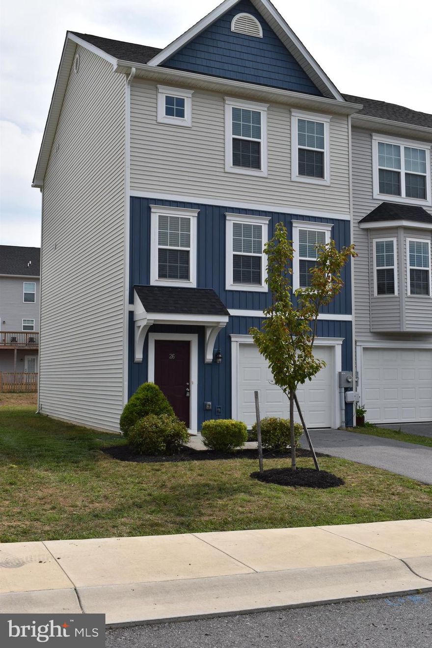 End unit townhome ready for immediate occupancy.  Lower level has one room that has been used as a bedroom, but could be a family/rec room.  Main level has HUGE family room, dining area, and very well apportioned kitchen.  Upstairs is three bedrooms and two baths.  Primary and one secondary have walk in closets.  Laundry in the lower level and furnished with washer and dryer.  Nice granite countertops, newly stained deck, and freshly painted.  This home is in GREAT shape.  Pets are case by case at landlord discretion.  All showings through landlord.