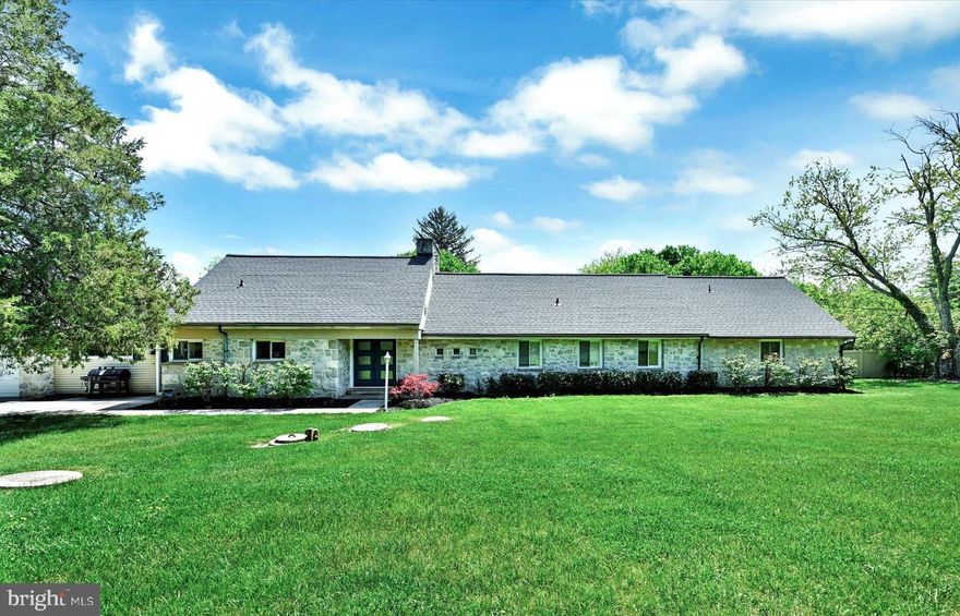 Welcome to your own private oasis in Greenspring Valley! Characterized by the classic features of the midcentury modern style including the open floor plan, clean lines, large windows, indoor-outdoor living and integration with nature, this stunning home sits on a beautifully landscaped one-acre homesite. The fenced-in yard is the perfect retreat for your furry friends. Inside, you'll find five spacious bedrooms and four and a half luxurious baths, making this home the destination to host weekend gatherings for out of area loved ones.  The kitchen is a true entertainer's dream, with ample counter space and efficient design, making it easy to whip up a feast that will leave them raving for more. Whether you're looking to work from home, have a home gym or perhaps an art studio, the study, which steps out to the patio, is sure to please. And when it's time to unwind, your guests will appreciate the variety of indoor and outdoor spaces to choose from including stone patio or the upper level recreation room adjoining a bedroom and half bath. The airy living room, flooded with natural light is sure to become a beloved place to relax with your favorite book or to recharge. This home offers the best of both worlds, combining the serenity of country living with the convenience of being just a short drive from Baltimore City. And with easy access to 695, you can quickly get wherever you need to go. Don't miss out on the opportunity to own this quiet sanctuary in Greenspring Valley - schedule your tour today! 

UPDATES: Flat roof 2021, sloped roof, 2022, 440 amp upgrade 2018, installed mini-split 2018, bathroom (gym) refinished 2019, half bath refinished 2019, refinished bar bathroom 2020, two main entry doors 2020, interior hall doors 2021 + 2023, new fridge 2021, owner's washer/dryer 2018, basement washer 2019, boiler in gym 2018, attic air handler 2019.