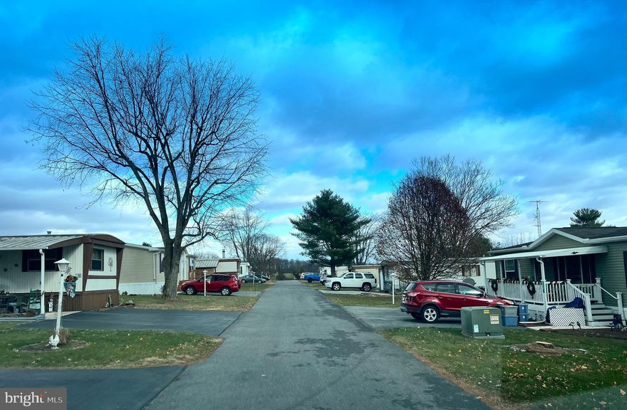 This property features 12.46 acres, 55+ mobile home community with 45 rental
pads, a farmhouse with 2 apartments and management office space. This mobile
home community also has a private well water system and a wastewater treatment plant.