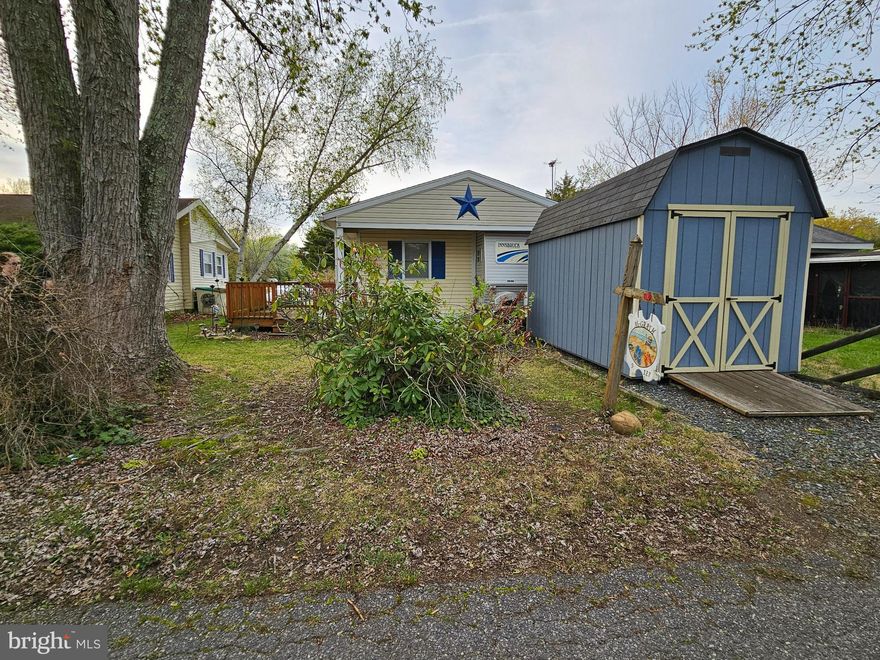 Beautifully maintained two bedroom getaway in a gated water oriented community. Located in Indian Acres Campground therefore, limited to 150 days a year no more than 100 consecutive days (not a full time residence). Open year round as well as bath houses as the off season the water is shut off.  So much to do with a lake, two ponds, and the water front to the Sassafras for fishing. Boat ramp for trips to the Sassafras or off to the Chesapeake Bay and points beyond or Georgetown with waterfront dining. A must see so be sure to check this one out.