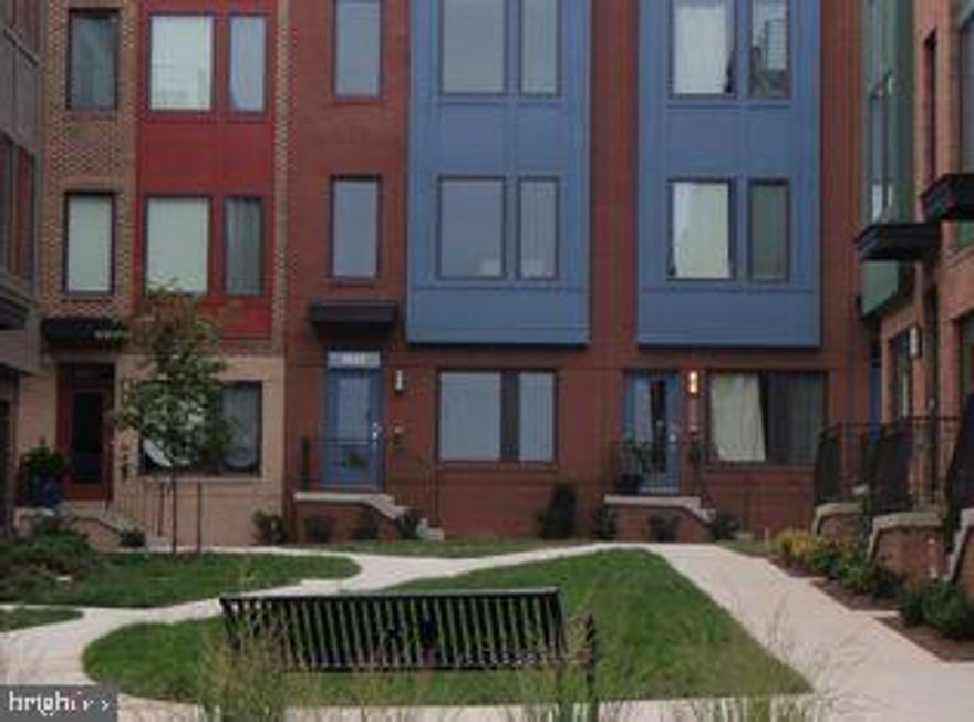 Nestled in the vibrant Hyattsville Arts District, this exquisite townhouse offers a harmonious blend of modern luxury and traditional charm. Spanning 1,416 square feet, this meticulously designed home features three spacious bedrooms and two and a half elegantly appointed bathrooms, perfect for both relaxation and entertaining. Step inside to discover a warm and inviting atmosphere, enhanced by plush carpeting and ceiling fans that create a comfortable ambiance throughout. The heart of the home is the gourmet kitchen, equipped with high-end appliances including a six-burner stove, ENERGY STAR refrigerator, and sleek dishwasher, ensuring culinary excellence for every occasion. The convenience of a stacked washer and dryer adds to the home's functionality. The open-concept living area flows seamlessly, providing an ideal space for gatherings or quiet evenings at home. Enjoy the luxury of an attached garage with a door opener, offering both security and ease of access. Outside, the community pool beckons for leisurely afternoons, while the surrounding arts district invites exploration and creativity. This property is not just a home; it's a lifestyle, offering the perfect balance of comfort, elegance, and community engagement. Experience the best of modern living in a setting that feels like home.