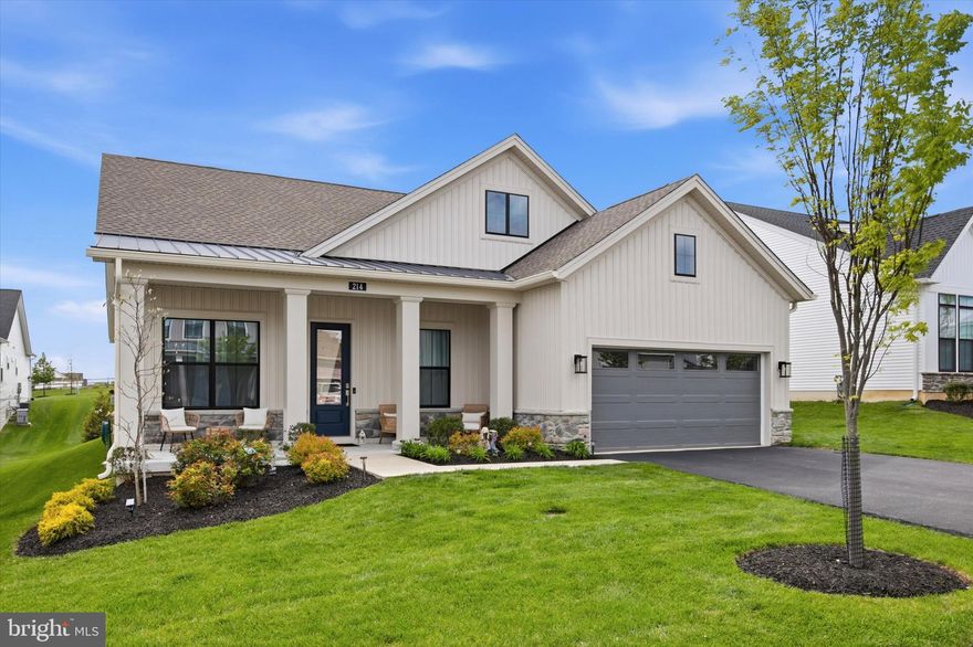 Welcome home to the Preserve at Marsh Creek, a 55+ community. With lawn maintenance and snow removal included in the association fee, you can spend more time enjoying the exclusive lifestyle this community offers. The impressive amenities, steps from your front door, include a clubhouse, fitness center, outdoor pool, and courts for pickleball and tennis, ensuring endless opportunities for recreation and relaxation. This stunning 2 bed + den, 2 bath Ranch home offers 2,207 sq. ft. of luxurious living space, seamlessly blending comfort and elegance. Step inside to find an open floor plan that invites warmth and connection. The spacious living area features a cozy gas fireplace centerpiece, with adjacent sunroom and deck access for relaxing al fresco. The double wide sliding glass door allows tons of natural light to flood the space, but also has an exterior tint for added privacy during the day. The gourmet kitchen is a chef's dream, equipped with high-end appliances and complemented by a generous island with counter seating and pantry for all your culinary needs. Retreat to the primary suite, boasting a lavish walk-in closet and a spa-like bathroom with oversized dual sink vanity and walk-in shower. There's also 1 additional bedroom, den that could easily be a 3rd bedroom with the addition of French doors, 2nd full bath, and laundry room. Additional features include luxury wide-plank wood floors, recessed lighting, 2-car garage and driveway parking, unfinished attic for plentiful storage, and whole-home 18KW generator. Experience the perfect blend of luxury and comfort this home and community offers! Schedule a showing today!