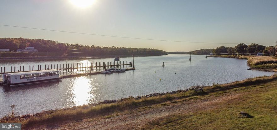 Nestled in a prime location along the C & D Canal, this vintage gem offers breathtaking water views, access to boating and water recreation. It is a diamond in the rough, offering a rare opportunity for restoration and transformation into a dream residence. Generous room sizes give this home ample space to reconfigure and customize rooms to meet your lifestyle. The main level features a large screen in porch, living room, dining room, kitchen, and half bath. The second level features 4 bedrooms and a bathroom.   The spacious yard is perfect for gardening, entertaining or simply enjoying the tranquil water views. A one car garage and large outbuilding providing generous storage capabilities.
This property presents a unique opportunity to create a valuable retreat with an outdoor oasis in the historical town of Chesapeake City.  A town with Victorian charm, restaurants, shops, galleries and so much more. Don’t miss this opportunity!