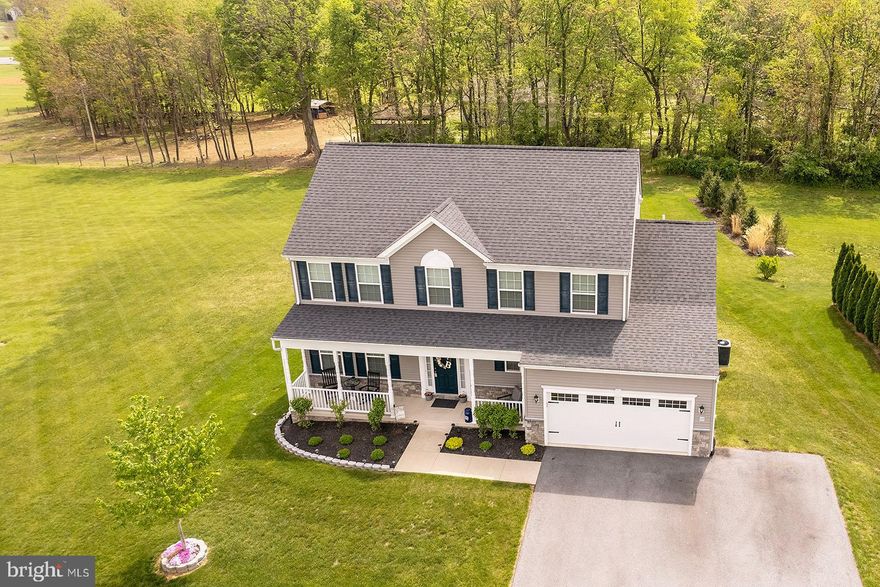 NO PLACE LIKE HOME!  READY FOR YOU TO MOVE IN AND BEGIN YOUR STORY!   THIS BEAUTIFUL 4 BEDROOM, 2.5 BATH HOME SITS ON AN ACRE OF LAND.  ENJOY A QUIET DAY WITH A BOOK AND CUP OF COFFEE OF THE FRONT PORCH OR OUT ON THE DECK.  ENTERAINING, NO PROBLEM, ROOM FOR EVERYONE!  IMMACULATE, AND READY FOR YOU.  LARGE OPEN FLOOR PLAN WITH KITCHEN, OPEN TO FAMILY ROOM AND FORMAL DINING AREA.   LOTS OF COOKIES TO BE MADE ON THE LARGE ISLAND, MEMORIES FOR A LIFETIME.   BASEMENT HAS BEEN PARTLY FINISHED AND READY FOR SOME BOARD GAMES OR WATCHING YOUR FAVORITE MOVIE. BASEMENT HAS ROUGH IN FOR ANOTHER BATHROOM, AND LOTS OF SPACE FOR STORAGE, OR FINISHING OFF TO ADD ANOTHER ROOM.  BASEMENT WALKS OUT TO SMALL PATIO AREA WITH STAIRS GOING TO THE UPPER DECK, ENTERING INTO THE KITCHEN.  LET YOUR STORY BEGIN, SCHEDULE AN APPOINTMENT TODAY!   YOU WON'T BE DISAPPOINTED!