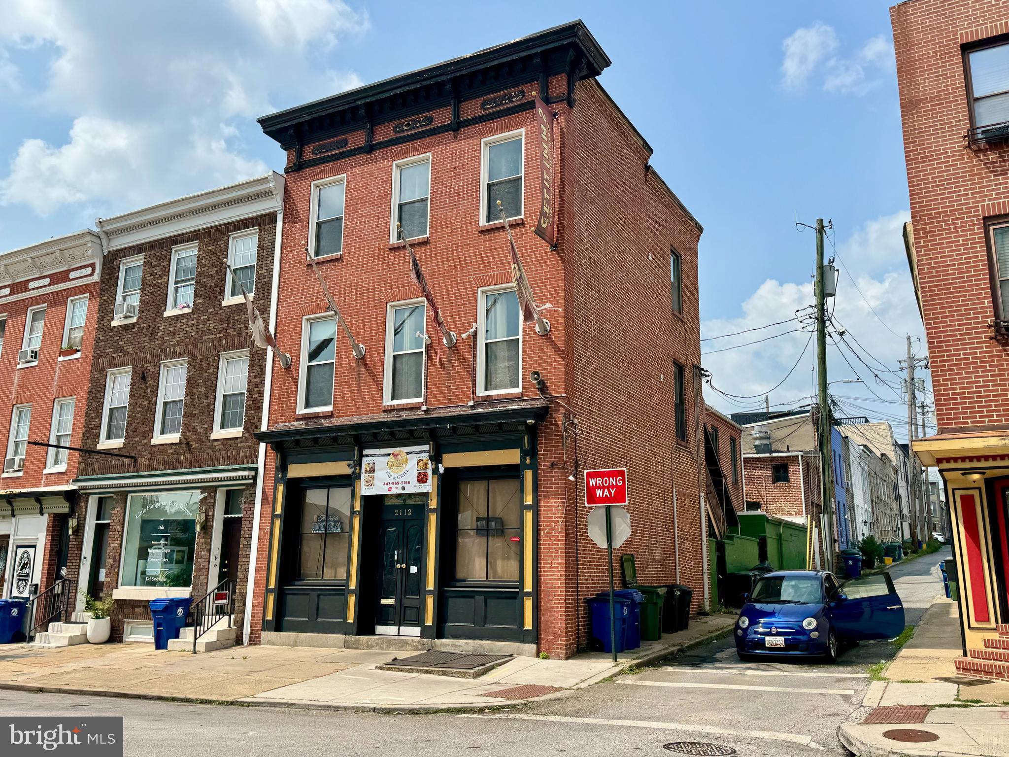 Historic 3-Story Mixed-Use Investment Property – 2112 Fleet Street (Real Estate Only – Goldies Seafood Bar & Grill is Not for Sale). Above the restaurant are three recently renovated apartments. Own a piece of Baltimore history with this remarkable three-story mixed-use property ideally situated between Fells Point and Canton, steps from Patterson Park. This 5,000+ SQ FT building now features a fully leased commercial space on the main level, home to Goldies Seafood Bar & Grill, a restaurant with a lease in place through 2030. Above the restaurant are three recently renovated apartments (all vacant and ready for lease @ $1,500/month each), providing great income streams. The sale includes the real estate & liquor license only—Goldies will remain as a tenant. With solid in-place revenue, an unbeatable location, and a rich historical legacy, this is a rare investment opportunity in one of Baltimore’s most vibrant waterfront neighborhoods. Sold As-Is—buyer to confirm use and zoning. Do not disturb the tenant. Showings are available on weekdays with 24-hour notice and proof of funds or lender pre-approval.