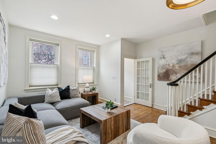 Charming and spacious 4 bedroom, 2.5 bathroom home with large patio in Passyunk
Square, one of Philadelphia’s most sought-after neighborhoods! With its handsome
brick façade, warm-toned wood front door, and beautiful stained glass transom with rose
detail, you know you’re in for something special when you walk up to this home. Enter
through the vestibule to be greeted by a sunny, open concept, hardwood floors with a
lovely inlay and tall ceilings. The living room, spacious yet cozy, is the perfect space to
host friends for a game or for quiet, night in watching a movie. Continue to the dining
area which can easily accommodate 6-8 people for your next family holiday gathering.
The well-maintained eat-in kitchen boasts ample shaker cabinetry and counterspace,
stainless steel appliances, and multiple windows, one overlooking your large back patio.
You’ll love the outdoor space for dining under stars or sipping on cocktails with friends.
A convenient half bath completes this floor. Once upstairs, you will find 3 bedrooms, two
with closets, and a shared hall bath with tub. The oversized top floor primary suite will
wow you with its cathedral ceilings and exposed brick. Large enough to accommodate a
king-sized bed plus two nightstands and a lounge area with wet bar, this primary also
boasts decent closet space. The en-suite bathroom features a stall shower, single
vanity, and a window. Off the primary suite is a new roof deck which will quickly become
your favorite spot to unwind whether enjoying a cup of coffee or doing outdoor yoga.
The unfinished basement is ideal for storage and houses the washer and dryer. This
home’s location is prime – just a few blocks off Passyunk Avenue, allowing you to enjoy
the many restaurants, coffee shops, bakeries, and retail along the corridor without the
noise. Around the corner from Gold Star Park and in close proximity to Capitolo and
Sacks playgrounds plus Jefferson Square. You’ll love the convenience of having Acme
and the Italian Market so close to home for all of your grocery needs. This lovingly
maintained home was just painted, has recently upgraded HVAC, a new roof and is just
waiting for its next owners!