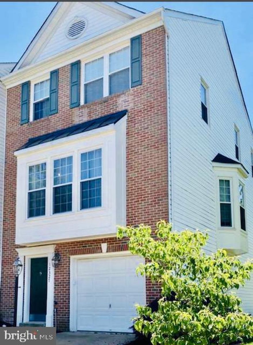 House is tenant occupied, please make sure that the schedule confirmation is required to show the house.   Three level brick facing end unit town house in the prime location in Bristow VA. This is a great place to live in. Very nice and specious three level town house with one car garage. This house is maintained very nicely. Water heater replaced in a month ago, roof 2019, HVAC interior parts was replaced in 2023. Very bright and specious house. One drive way parking, one garage parking and lots of street parking space right nest to the house.