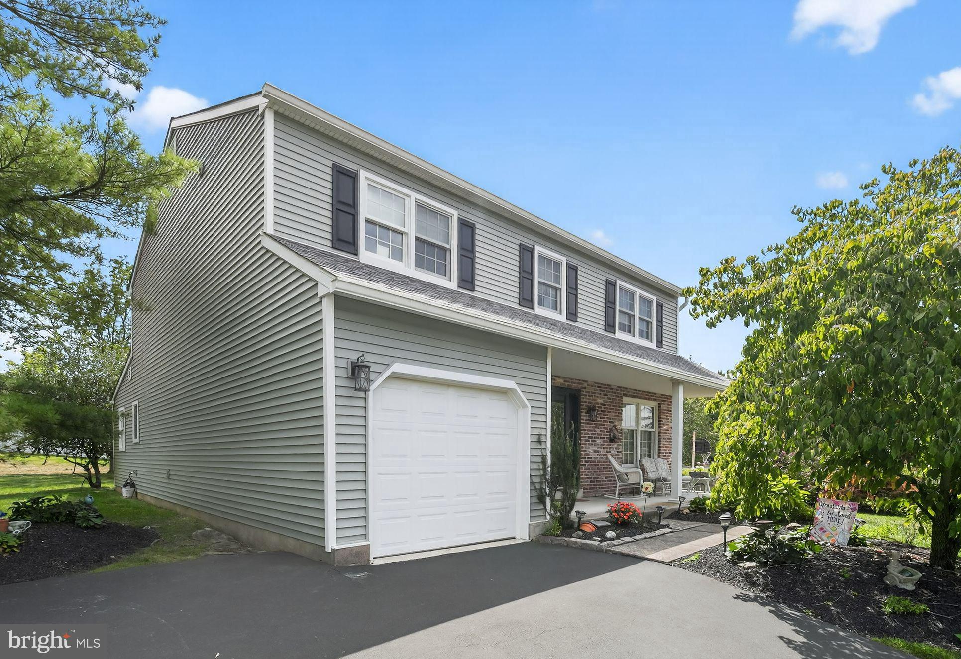 This four-bedroom, three full bath Colonial is a rare find in Oreland/Springfield Township. Built in 1980, this home offers a spacious and thoughtful layout, timeless curb appeal, and features that are hard to come by. Step onto the welcoming covered front porch and enter the foyer, where you'll find a warm and inviting living room featuring a gas fireplace—an ideal spot for relaxing or entertaining. The formal dining room, accented with two built-in corner cabinets, provides plenty of space for family gatherings and holiday celebrations. The extra roomy kitchen is a true highlight of the home because it is loaded with functionality. It features an abundance of cabinet and counter space, a five-burner gas stove, Italian tile backsplash, breakfast bar, and ample room for preparing meals and entertaining. The adjoining breakfast area opens to a large rear deck through sliding glass doors, where a retractable awning provides shade and comfort for outdoor dining or relaxing. The family room, accented with classic wainscoting, offers flexible space that could easily function as a home office, playroom, or even a first-floor bedroom. A full bathroom on the main level is a rare and valuable asset in a Colonial-style home, making first-floor living truly possible. There's also a convenient laundry/mudroom with access to the one-car attached garage, completing the first floor. Upstairs, the wide hallway includes a double linen closet and leads to four generously sized bedrooms. The primary suite offers both a walk-in closet and a second double closet, along with a beautifully updated en-suite bath featuring travertine tile and a large stall shower. Three additional bedrooms provide excellent closet space and share a full hall bath. The full basement offers abundant storage and great potential to finish into a recreation room, home gym, or additional living space. Outside, the backyard is beautifully landscaped with mature plantings and a peaceful atmosphere—perfect for play, gardening, or unwinding after a long day. This home has been beautifully maintained and a perfect example of this is the newer roof that was installed in 2021. One of the most unique features of this home is its location. Tucked away on a quiet street, the home offers privacy and tranquility. Yet it's conveniently located within the highly sought-after Springfield Township School District and close to everything: Route 309 Expressway, the PA Turnpike, Flourtown Farmers Market, local restaurants, parks, schools, ball fields, and Chestnut Hill. This is a fantastic opportunity in an unbeatable location—don’t miss your chance to make this exceptional home your own.