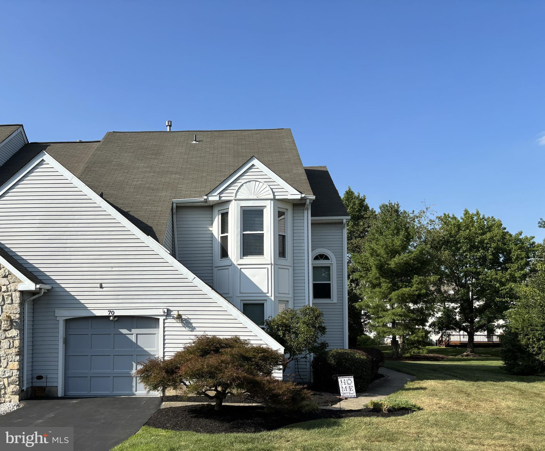 Welcome to the GWYN AYRE community. This exceptional residence presents an excellent opportunity to reside in a highly sought-after, walkable neighborhood within the Wissahickon School District. This spacious and bright end-unit townhome offers three bedrooms and 2.5 baths, thoughtfully located in a tranquil section of the development.
The meticulously maintained home features an open two-story entry foyer that seamlessly transitions into a large family room with fireplace, a dining room with hardwood flooring, and a versatile first-floor den or office. The recently updated eat-in kitchen is equipped with quartz countertops, white Shaker-style cabinets with chrome hardware, stainless steel appliances, and hardwood flooring providing access to a private deck overlooking open green space. Additional first-floor highlights include a powder room, closet, and direct interior access to the garage.
Ascending the turned staircase to the second floor reveals a dedicated laundry area, a hall bathroom featuring ceramic tile and dual sinks, linen closet, and two generously sized bedrooms with ample closet storage. The generous master suite, accessed through double doors, boasts a large walk-in closet, two additional closets with shelving, and a spacious en-suite bathroom, equipped with ceramic tile, a shower stall, bathtub, and Jack-and-Jill sinks.
The finished basement offers carpeting throughout and a separate storage/workshop area. Homeowner Association monthly dues encompass trash collection, lawn maintenance, and common area snow removal. The property is conveniently located near Route 309, Route 202, and the Spring House Shopping Center. It's just a short drive to beautiful downtown Ambler where you can enjoy shopping, terrific restaurants and nightlife. Don't miss the chance to make this exceptional townhouse your new home!