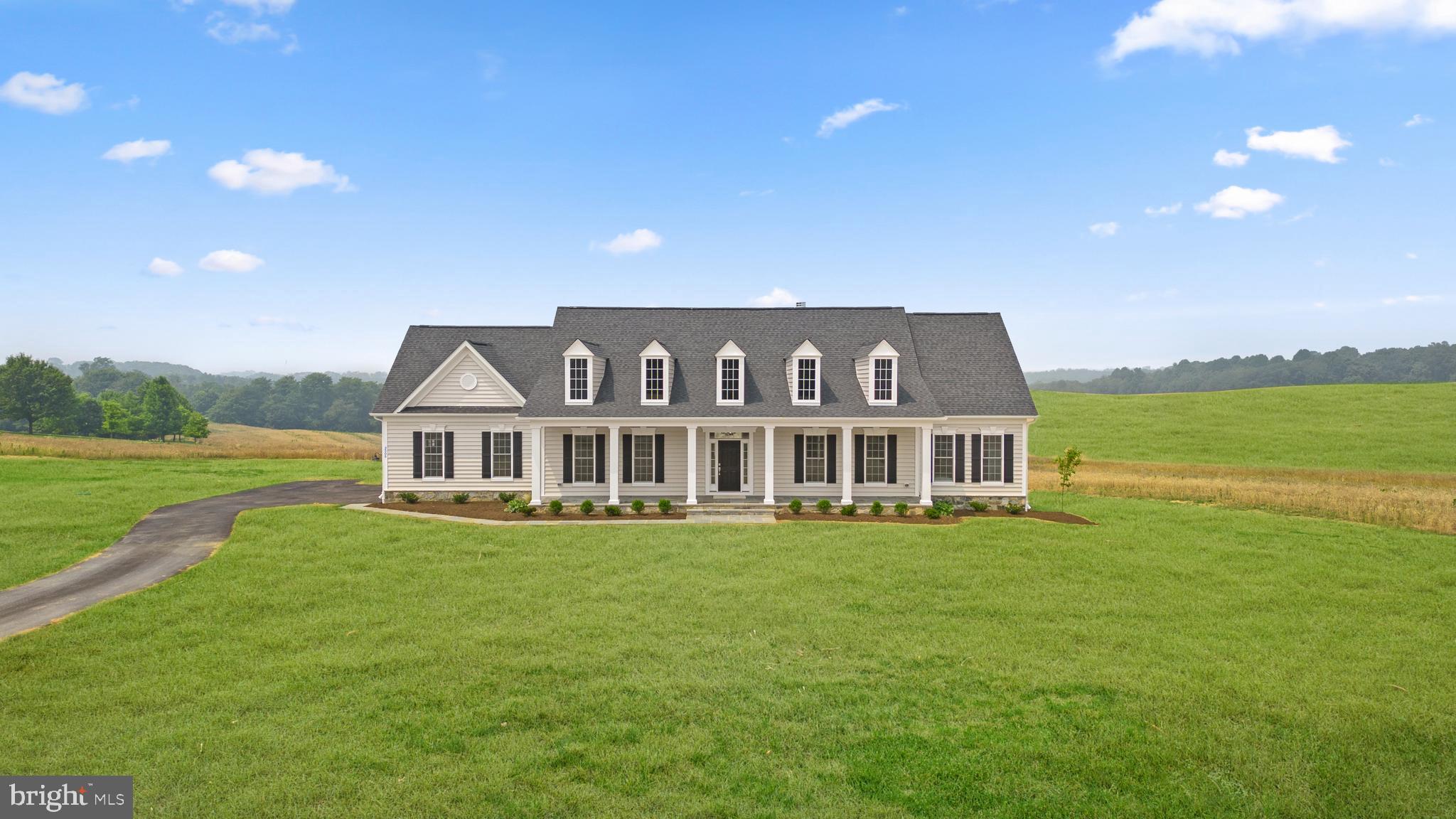 ✨ Builder Special at Highgate! ✨ For contracts ratified by 9/30, enjoy a free finished recreation room and full bath in the lower level—a limited-time incentive you won’t want to miss. This is the last available lot in Highgate—a 1.27-acre homesite with pastoral views, a level building area, and a backdrop of mature trees. Set in Hampstead, Maryland, Highgate offers a rare combination of peaceful surroundings and everyday convenience, with easy access to Route 30 plus shopping, dining, wineries, golf courses, craft breweries, and parks all nearby. From the wide covered front porch, to the breezy, open layout of the living spaces, this floorplan is relaxed through and through. Thoughtfully planned, the Harwood is as stylish as it is comfortable. Indulgent features such as the alcove entry to the Owner’s Suite and the sitting room/office with optional dual sided fireplace make this charming home feel like a resort getaway. resented in partnership with JMB Homes, Highgate offers a unique opportunity to thoughtfully design a quality custom home in an idyllic rural location. Personalize one of six carefully curated floorplans to suit your needs, or meet with us to dream and design a one-of-a-kind home to perfectly suit your lifestyle.