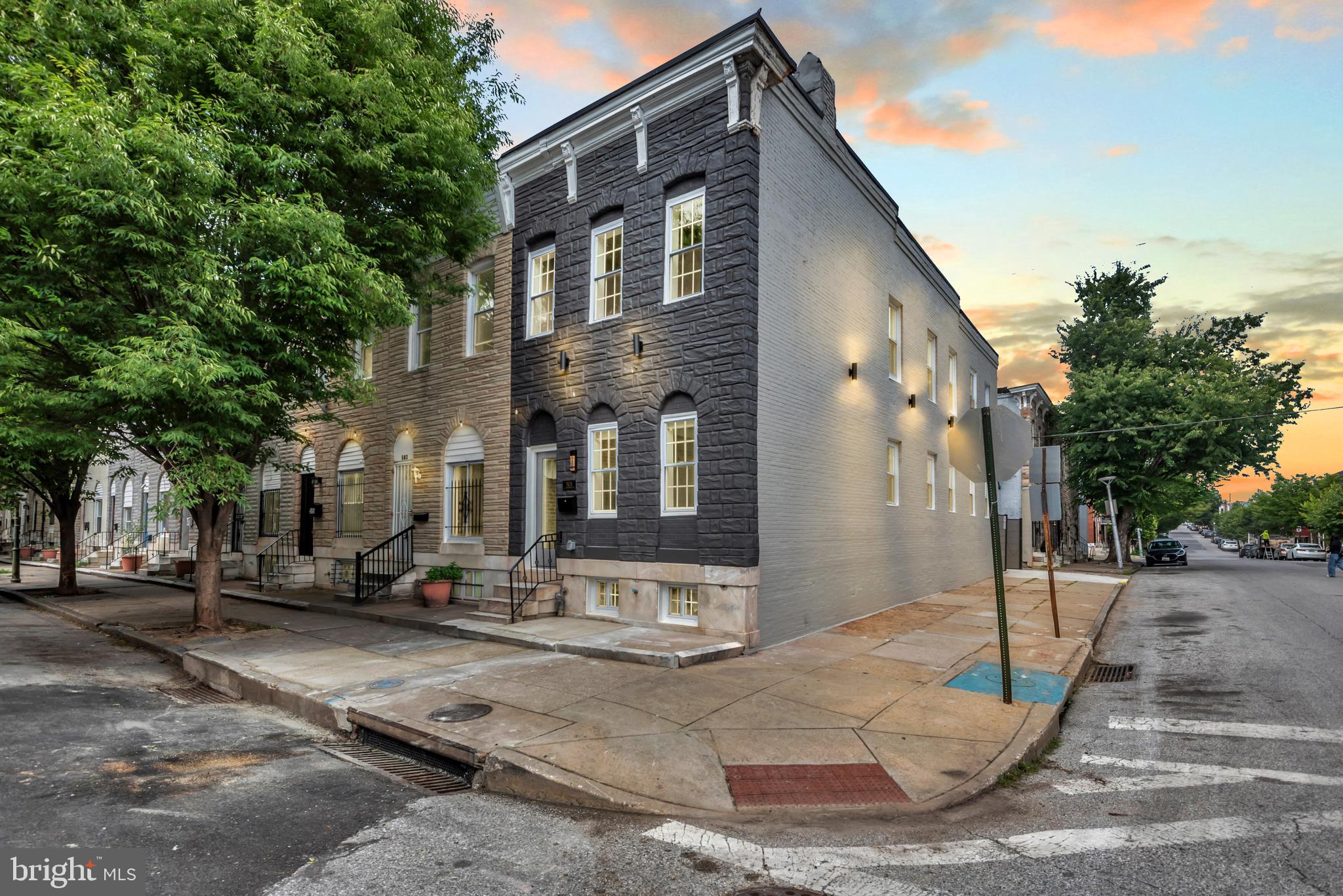 Welcome to this beautifully renovated 3-bedroom, 3.5-bathroom home in the heart of McEldery Park! This spacious residence features a stunning open-concept design with custom iron railings and a modern kitchen complete with a waterfall island—perfect for entertaining. The expansive primary suite offers a private retreat with its own full bath, while the top-floor laundry adds everyday convenience. The fully finished, huge basement provides additional living space ideal for a media room, office, or guest suite. Enjoy off-street parking with a private parking pad and stylish finishes throughout. A true must-see in Baltimore City!