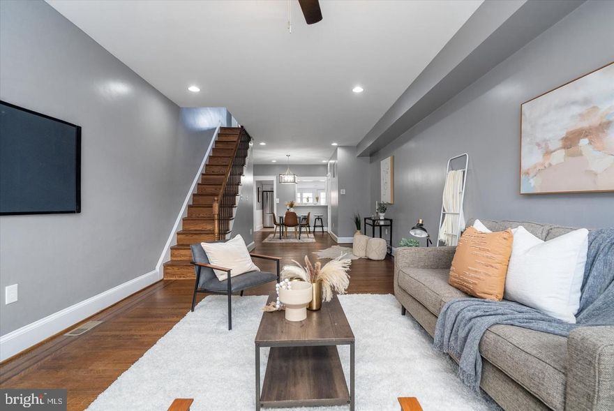 PRICE IMPROVEMENT!  Welcome to this charming brick-front rowhome in the heart of Brewers Hill! The main level boasts a welcoming and mostly open modern floor plan, perfect for entertaining, with a beautiful kitchen showcasing stainless steel appliances and elegant granite counters and recently redone.  Unbelievably beautiful hardwood floors throughout the home, with incredible craftsmanship shown. Powder room rounds out the main level. The outdoor patio off of the kitchen is a grill master's dream with ample space for entertaining. Upstairs, you'll find two spacious bedrooms with exposed brick, a tiled and beautiful full bath, skylights in both the bathroom and the reading nook in the hallway. The second bedroom opens up to a patio, providing a wonderful outdoor space to relax and enjoy.  All new windows with lifetime transferrable warranty!