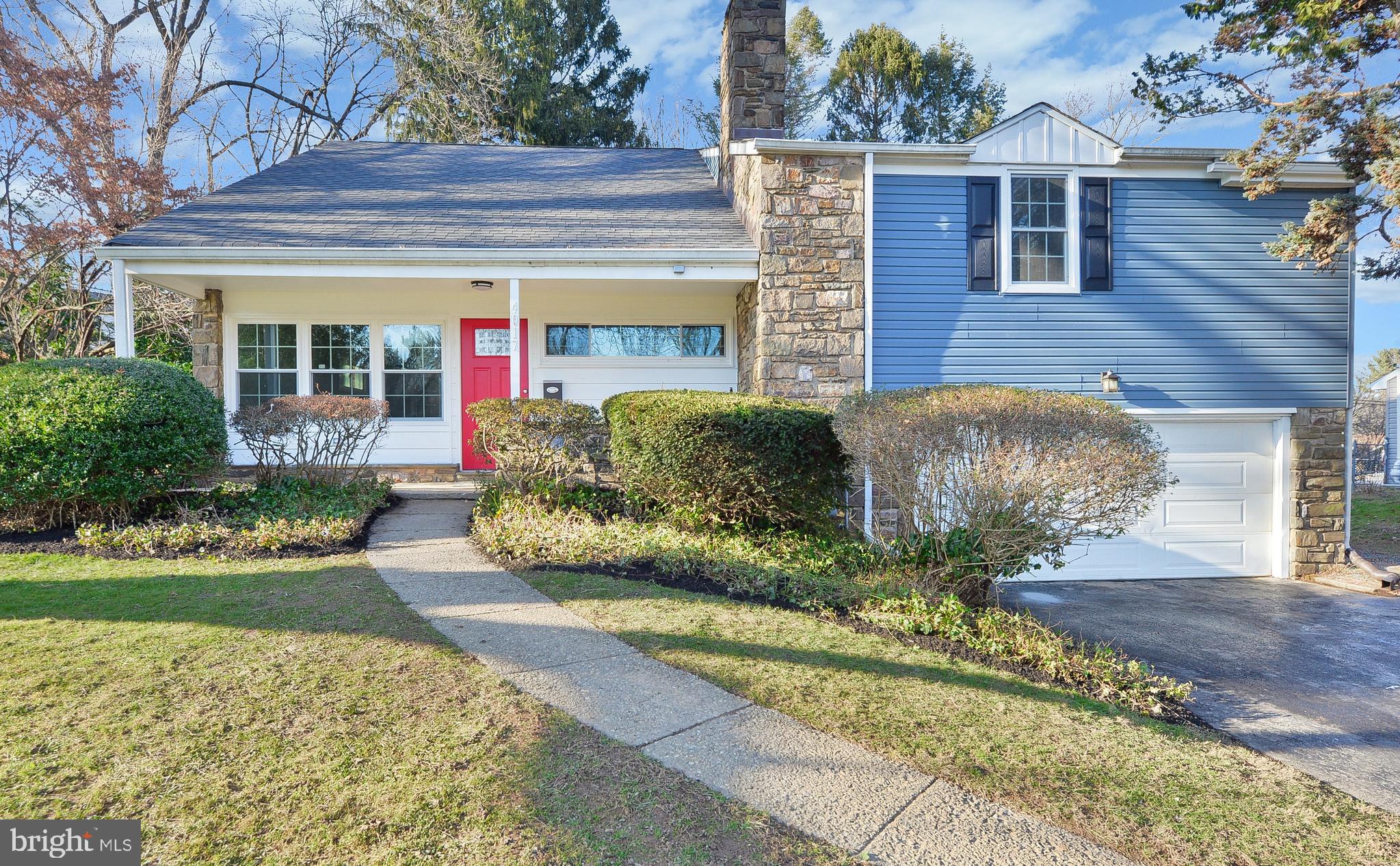 Come see this sun drenched, beautiful home located on a quiet road in the highly sought-after Lafayette Hill section of Whitemarsh Township. Modern and Meticulously Renovated! As soon as you pull up and see the beautiful exterior, perfect landscaping, and the RED DOOR you know you are in for a treat! This home features 4 Bedrooms, 2 1/2 baths, Hardwood Flooring, freshly painted throughout and over 2,400 square feet of living space. Enter the brand-new kitchen with Shaker Soft-Close cabinetry, Quartzite countertops, Breakfast island and NEW stainless-steel appliances. A true cooks delight! Just off of the kitchen is the Dining and Living areas complete with Gas Fireplace! Great for entertaining friends and family. Down on the lower level you will find the den with private access to the rear covered patio and roomy yard. Also in this area find the Conveniently located Powder room. Upstairs you will find 4 generously sized bedrooms, Laundry area, New Hall Bath, and more! One of the bedrooms is your Suite with private Full Bath and Huge Closet! The forced hot air and central AC add to your comfort. This Home has Interior access to the Built-In Garage and driveway with ample parking. Easy access to major roadways. Minutes from shopping, and restaurants. The convenience of the location and all of the upgrades make this home truly unique, Put this on your List and book your appointment today!!