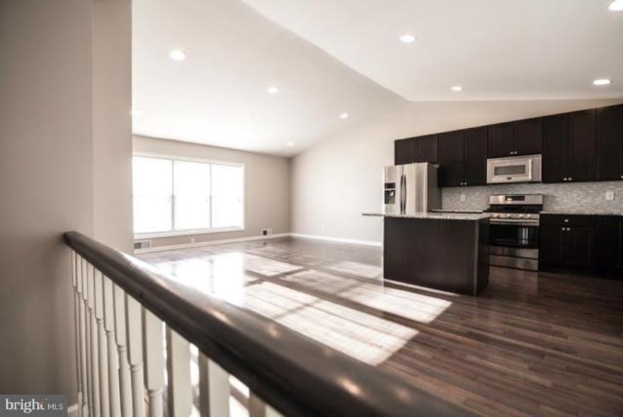 WELCOME HOME!! 5 BEDROOM 3 BATH RANCHER. Large Open Space - Living Room/ Dining Room/ Kitchen - Great for Entertaining! Kitchen has Granite Counters and SS Appliances. Exotic hardwood floors. Recessed Lighting throughout. Large Fully finished basement.  Agent has selling interest.