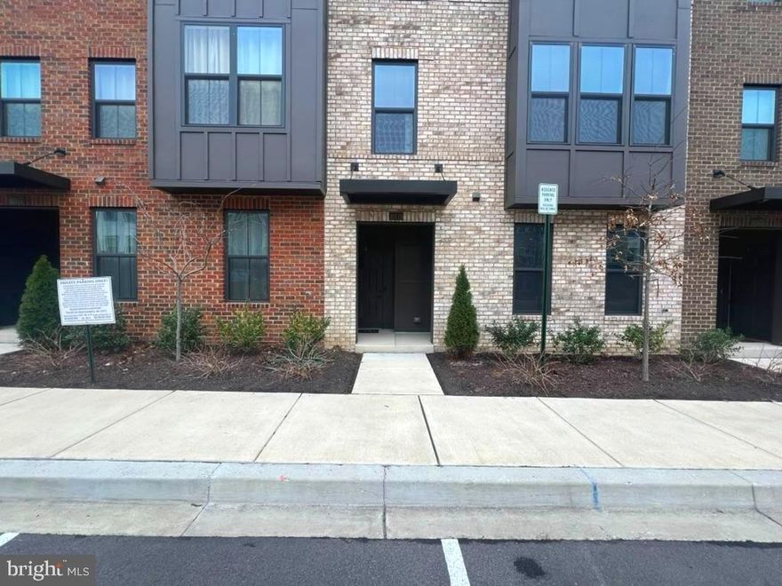 Stunning 3-year-old townhouse w/ 1 car attached garage. Elegant and spacious, the open floor plan is perfect for entertaining. Home boasts 9-foot ceilings, recessed and pendant lighting, stylish luxury wood flooring, neutral decor, a balcony, powder room. The gourmet kitchen features chic espresso cabinets, granite countertops,  breakfast bar, gas cooking, and stainless appliances. Upper floor has three bedrooms, each with generous closet space, and a bedroom-level laundry room. The primary owner's suite has 2 large walk-in closets, an adjoining luxury bathroom w/ double vanity, large 2-person shower w/ seating.   A commuter's dream location, with easy access to Rt. 1, I 95, 295, 216, Rt. 32 -minutes to the B/W Pkwy and walking distance to the Laurel Marc Train! Everything you need is at your fingertips. Community amenities include a dog park, community garden, and trails to enjoy. Conveniently located near shops, entertainment, Laurel Town Centre, Fort Meade Army Base, & NSA