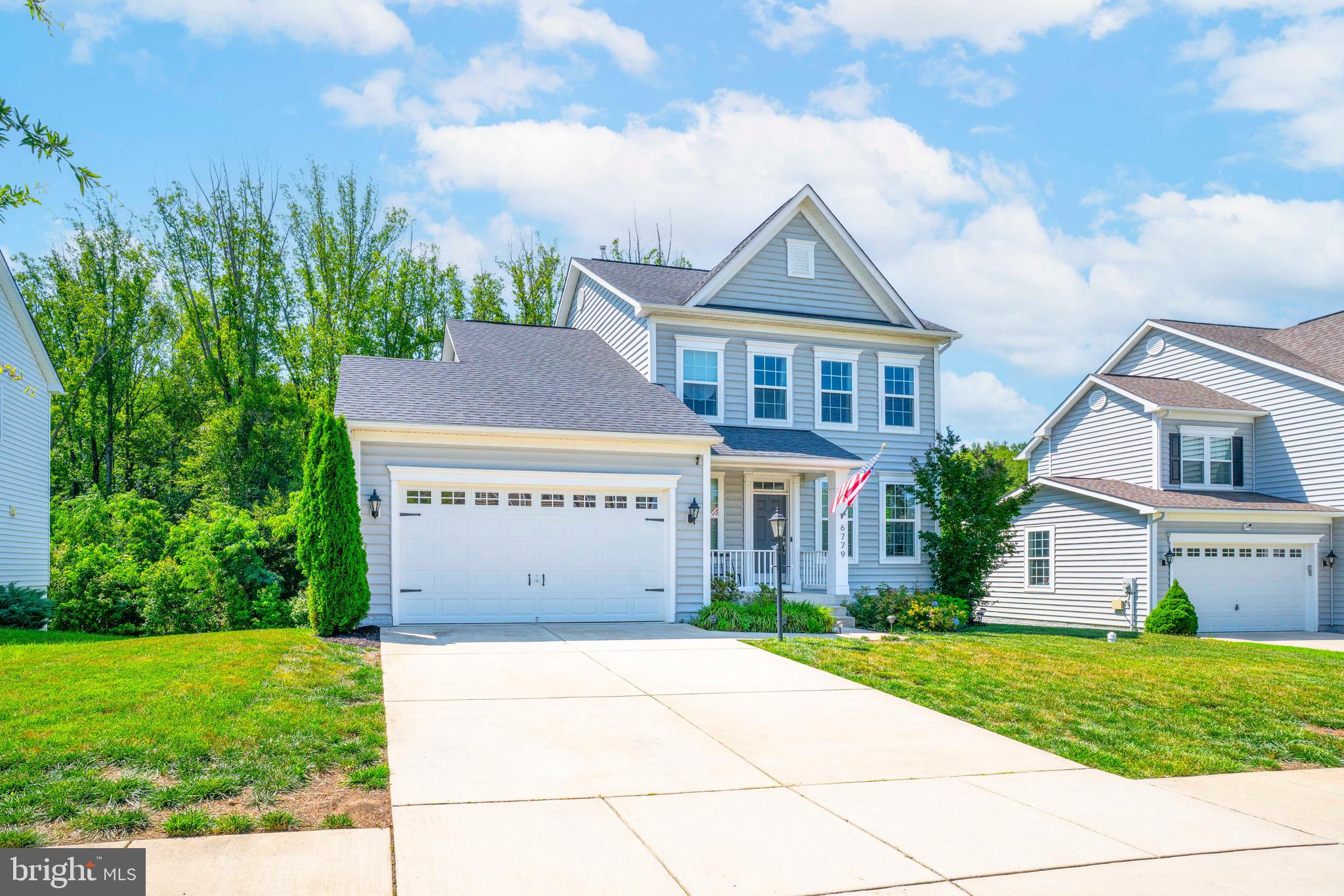 Beautiful Colonial Home in Sought-After Marshall Grove Estates!
This stunning 3-bedroom, 3.5-bath colonial offers modern living with classic charm. Enjoy the engineered hardwood flowing throughout the main level, an open-concept layout, and soaring cathedral ceilings in the living room that flood the space with natural light. The spacious kitchen features an extensive island perfect for entertaining, and opens to a bright sunroom—ideal for casual dining or morning coffee.
A versatile flex room on the main level can serve as a home office or formal sitting area. Upstairs, you'll find a convenient laundry room and generously sized bedrooms. The expansive, fully open basement includes a walk-out to a private backyard that backs to serene woods—perfect for relaxing or hosting gatherings.
Located in a community with great amenities including a dog park, playground, and open green spaces. Don't miss your chance to own this gorgeous home.