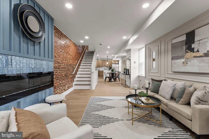 Welcome to a beautifully designed 3-bedroom, 3 full bathroom 1 car garage residence that effortlessly combines style, comfort, and urban sophistication in the heart of Baltimore. This stunning home features an open, light-filled floor plan with two elegant fireplaces that create a warm and inviting atmosphere throughout. The chef-inspired kitchen is outfitted with gleaming stainless steel appliances and custom cabinetry, perfect for both everyday living and entertaining. A fully finished basement offers endless possibilities — whether as a home theater, gym, or additional living space. Step outside and ascend to your own private rooftop deck, setting the stage for a peaceful evenings under the stars. Every inch of this home has been thoughtfully curated with stylish finishes and intentional design details that must be seen to be fully appreciated. This is not just a home — it is a lifestyle. Schedule your private showing today.