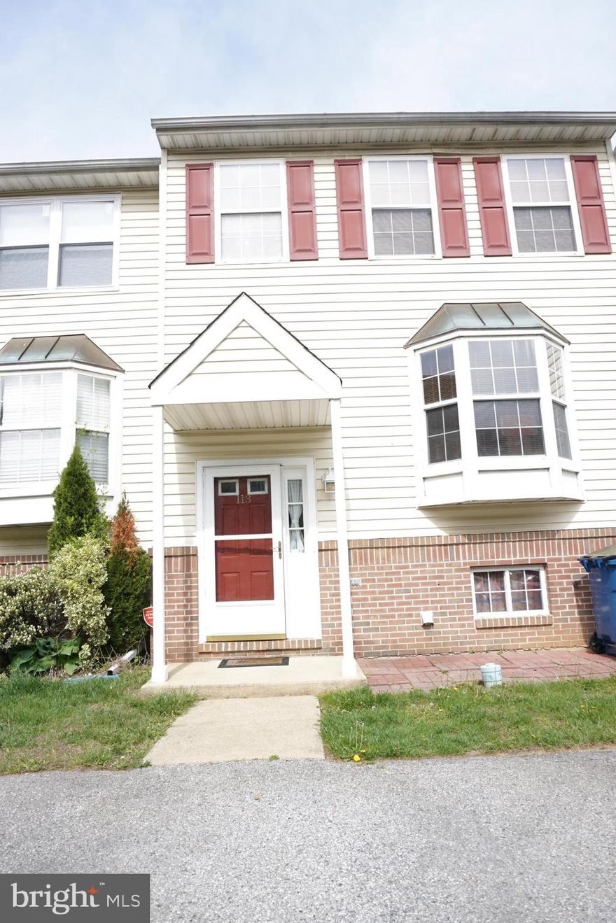 This is a spacious 2-bedroom end-unit townhouse that features a loft that can be used as a 3rd bedroom.   This home features vinyl flooring on the main level. Nice and bright with a bay window in the dining area, and sliders leading to the deck. Neutral throughout with newer carpet in the bedrooms and lower level. The third floor features a loft that would be a great office or another bedroom. The main bedroom features a ceiling fan and skylights. The kitchen opens to the living/dining area with a breakfast bar. The finished lower level is a perfect family room, with access to the back yard. Fenced back yard with trees in the back to give you some distance between other homes. The furnace was replaced in the last 4 years. This neighborhood is so convenient to live in, you are close to a grocery store, the YMCA, Glasgow Park, a bus route, and just 10 minutes to Route 1. The house will have a new roof 5/7!