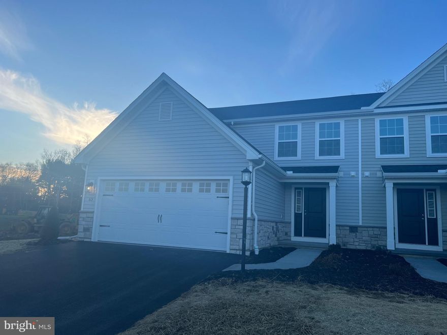 Absolutely stunning new build home in the Cumberland Preserve community located in CV Schools and Middlesex Township! This Primrose floor plan is a 2-story home that takes duplex living to the next level with its lofty footprint, boasting 2,125 sq. ft. of living space, and the convenience of 1st FLOOR LIVING! The owner's suite features an upgraded raised height tray ceiling creating an open airy feeling to the room with an owner's bathroom that checks off all the YES PLEASE features including a double bowl vanity. 
Two additional bedrooms, both outfitted with large walk-in closets of their own are found on the second floor, PLUS, a loft for additional living space!   This home includes a deck and backs up to a mature wooded tree line that offers a private escape and a beautiful view to enjoy your outdoor space.  Cumberland Preserve is a  unique community set among 70 acres of open space that includes a walking path, playground, open fields, and shaded pavilion areas for the best in community living.