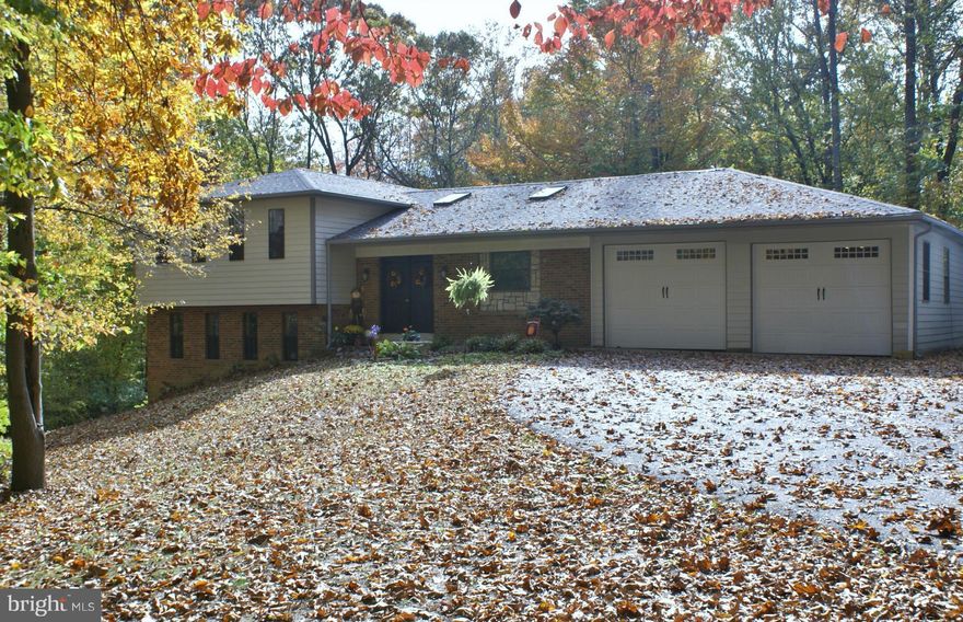 Beloved home seeking new owners that will cherish this private, park-like setting property. Main living area is completely open (kitchen, dining, living)with vaulted ceilings/skylights kit area. Access to large enclosed 3 season room with skylights/vaulted ceiling from main liv rm. Improvements/upgrades over the last 10 yrs. to present. Roof, heat pump, gutters/downspouts all added recently.