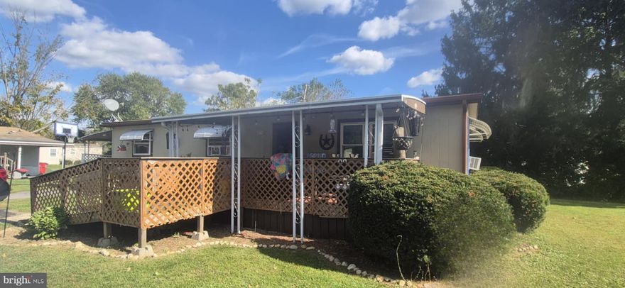 Welcome to 8774 Breinig Run Circle in Breinigsville’s Green Acres Community! Recently painted exterior! This updated 2-bedroom, 2-bath home offers comfortable living in an all-ages, pet-friendly neighborhood. Enjoy the spacious front and back decks, perfect for entertaining, along with a bright kitchen, dining room with sliding glass doors to the backyard, and a generous living room. Multiple parking spaces, including a carport and additional spaces in the private cul-de-sac. Green Acres provides fantastic amenities, including a pool, hot tub, clubhouse, playground, basketball and tennis courts, on-site management, and RV storage. Schedule your showing today!