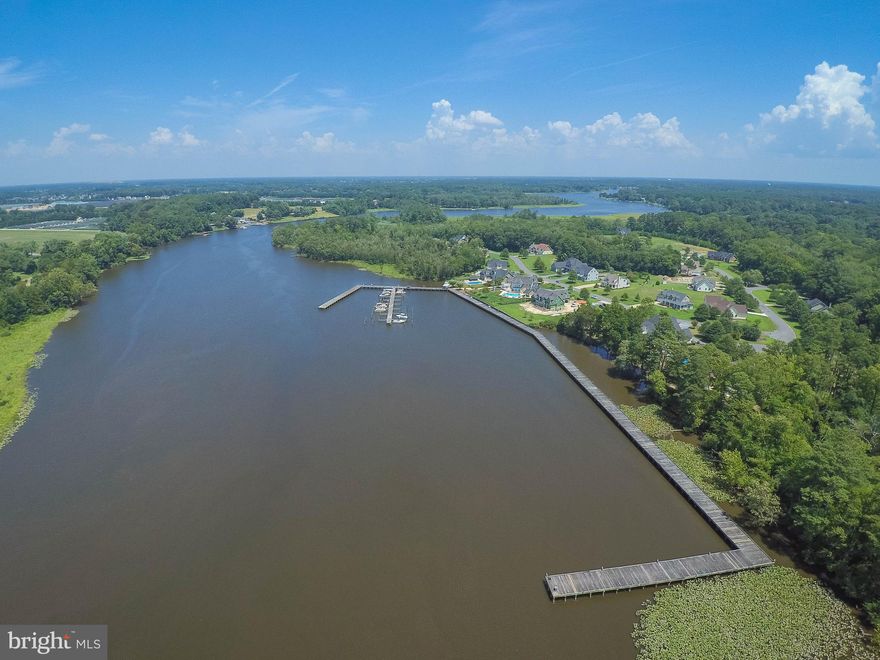 LOT 34. Build your dream home in the gated, waterfront community of Village Down River, sited on the Wicomico River, designed to coexist with the natural environment. NO Builder Tie-In! Enjoy the - community dock, boardwalk, hiking trails through forest and wetlands, the historically, renovated White Hall Plantation House for neighborhood gatherings, tucked away just minutes from shopping, dining, entertainment, and medical facilities in Downtown Salisbury; a quick trip to the bypass, but in your quiet neighborhood of lovely, diversely-customized homes. HOA dues - Lot:  $300/Q or $1200/yr, Home: $486/Q  or $1944/yr; SRF fee [SRF = sewer replacement fund, which is mandated by the county, is assessed to each lot every year]: $153/yr; Boat slip owners: $100/yr; Capital Contribution: $150. Sizes, taxes approximate. Owner is licensed realtor in the state of Maryland; agent has financial interest. Home/Lot Packages available. Sellers do not split transfer/recordation taxes and fees.