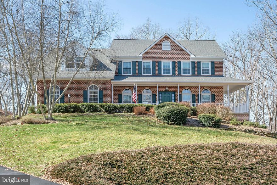 Lots of room to spread out in this gorgeous colonial in one of the best lots in South Wales!  Newly remodeled kitchen with granite countertops and stainless appliances, eat in area, family room with wood burning fireplace, office with built in bookcases, formal DR & LR, main floor has brand new hardwood.  Master suite has remodeled bath with soaking tub and large tile shower, plenty or room in this master with built in window seating plus small room directly off master.  Walk in closet and laundry chute.  Several other bedrooms with bath