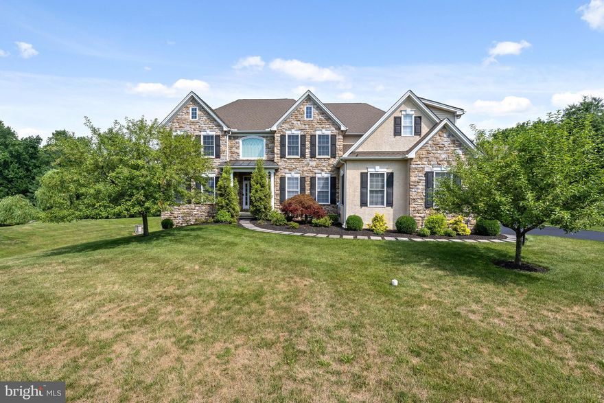 Stunning home in the sought after community of Pondview and Garnet Valley School District. Built by Benson Homes as a spec home, the original owners have meticulously maintained and updated this property. Situated on 1.8 acres with a pond offering a picturesque setting and your own nature preserve to include wildlife and nearby woods. A grand front to back entrance hall leads to a backyard oasis with a tiered Trex deck, pergola and inviting in-ground saltwater pool with hot tub and lagoon - perfect for family gatherings and outdoor entertainment. This 5 bedroom, 4.5 bath home has an open floor plan with well-proportioned rooms. The entrance hall is flanked by a formal living room and dining room.  The dining room flows seamlessly into the open gourmet kitchen and breakfast room, which boasts floor to ceiling windows offering great natural light.  All open to the family room with gas fireplace. There is a mudroom entrance with custom cabinets, wine refrigerator, two pantries, back stairway and garage access. Completing the first floor is an office/study and half bath. The second floor offers a luxurious primary suite with a sitting area with built-in desk, refrigerator, walk-in closets and a large primary bath with a soaking tub. The primary is off the main stairs and is its own separate wing. There are 4 additional bedrooms with two Jack-and-Jill baths. Each room has great natural light. Completing the second floor is a large laundry room for added convenience. The lower level offers a large room for entertainment with a full bath complete with a steam shower. Mature landscaping surrounds this outdoor oasis, making this home both elegant and functional. Additional amenities include a whole house generator and lawn sprinkler system. Convenient location minutes from I95, Rtes. 322, 202 and 1. Great location and easy access to shopping, restaurants and much more!