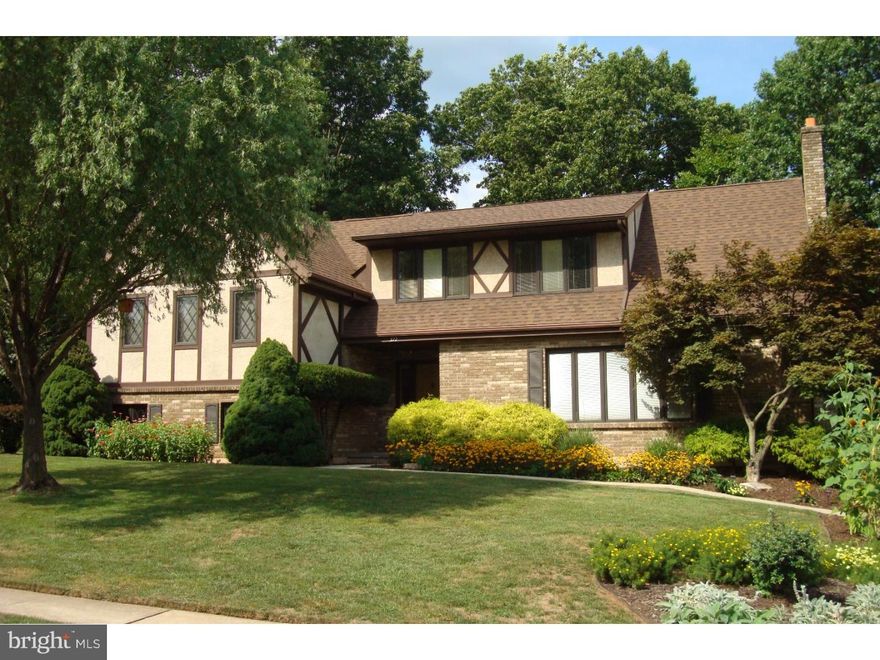 Well built Tudor Style Split in quiet location. Wooded rear overlooks creek (no flood rise). Attached side entry four car garage. Well landscaped with flowers for all seasons. Newer roof, newer high efficiency gas heat and central air. Central vac system, Quakermaid kitchen, Pella windows, semi finished basement could add 230 sq. ft. of living space. This a very special home! One year warranty with acceptable agreement of sale.