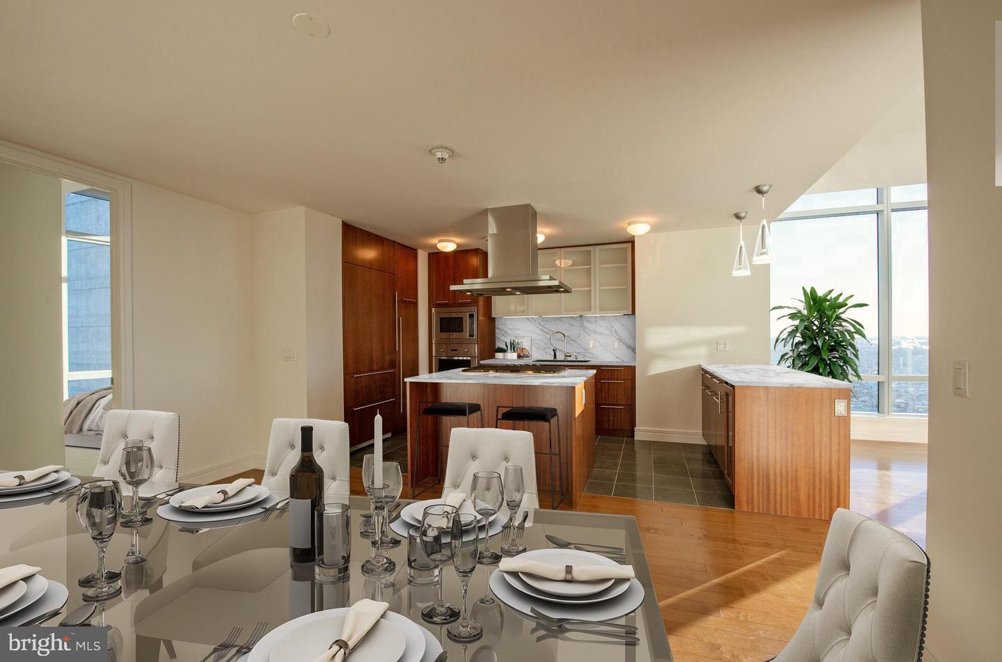 Experience unparalleled luxury and iconic views from this stunning 3-bedroom, 3.5-bath residence at The Ritz-Carlton Residences Philadelphia, one of the city’s most prestigious addresses. Located on the 45th floor, Residence 45G offers breathtaking southwestern views, including the iconic silhouette of Ben Franklin atop City Hall, all framed by soaring 11-foot ceilings unique to this level.
Designed with sophistication in mind, this residence features sleek hardwood floors in the living and dining areas and the third bedroom/office, while the primary and secondary bedrooms are appointed with plush carpeting and en-suite baths adorned in Calacatta and Crema Marfil marble. The chef’s kitchen is a showpiece, equipped with top-tier stainless steel appliances, including a Viking wall oven and microwave, paneled Sub-Zero refrigerator, Miele dishwasher, and Uline wine refrigerator.
Residents of The Ritz-Carlton enjoy world-class amenities that rival the finest hotels, including a chauffeur-driven Mercedes S-Class, a state-of-the-art fitness center, an indoor pool with locker rooms, a yoga room, a media screening room, and a resident lounge with WiFi. Outdoor spaces include dog runs and an enclosed park with a tranquil waterfall feature. A new wraparound terrace is coming soon, complete with lounge seating, fire pits, and an outdoor kitchen.
Additional perks include private resident-only access to the adjacent Ritz-Carlton Hotel, offering discounted rates for dining, spa services, and accommodations.
Currently tenant-occupied until June 30, 2024, this exceptional residence offers an unparalleled lifestyle of sophistication, convenience, and elegance. Don’t miss the opportunity to make one of Philadelphia’s finest residences your own.