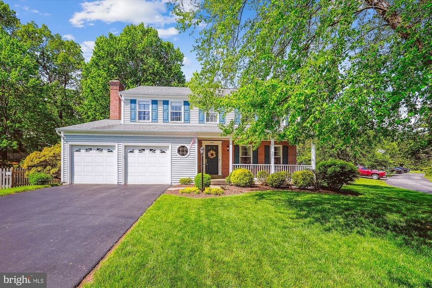 Pride of ownership shines throughout this meticulously maintained home, cared for by the original owners. Situated on a generous lot, this property features an oversized front and fenced backyard, plus an expansive rear hardscape that's perfect for outdoor entertaining or relaxing evenings. Step inside to find classic details like chair rail and crown molding, a wood-burning fireplace, and bright, welcoming living spaces. The large front porch invites you to sit and enjoy quiet mornings, while the spacious driveway easily fits six vehicles—ideal for gatherings or multiple drivers. Major updates have already been done, including a new dual fuel high-efficiency HVAC system and a newer roof, giving you peace of mind and energy efficiency. Located just minutes from the 234 Bypass, I-66 and the VRE station, this home offers both convenience and comfort in a well-established neighborhood. This is a rare opportunity to own a home that blends charm, space, and smart updates—schedule your tour today!