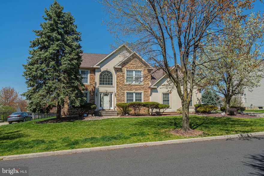 Offers due 4/17/2023 by noon!  Lovely 4 BR, 2.5 BA colonial in the highly sought after Green Hills subdivision! Enter into the sun drenched tiled center foyer. The 1st FL offers an open concept LR/DR, eat in kit which opens to the FR featuring vaulted ceilings and gas FP, a wall of windows and gleaming HW floors, laundry room w/ wet sink, and a home office w/ closet which could easily be a 1st FL BR adjacent to the expandable half BA. Upstairs, you'll be impressed with the roomy primary suite complete with 2 closets (one walk in), an en suite primary BA with soaking tub/ shower and double vanity, as well as an unfin bonus space over the garage. 3 addtl Bus and a 2nd full BA complete the upper level. The basement adds approx 800 sq ft of finished living space suitable for a rec room, 2nd FR, home office and gym while still allowing adequate storage. A large flat yard, deck, 2 car garage and oversized driveway on a quiet side street in this popular community add to the amenities.