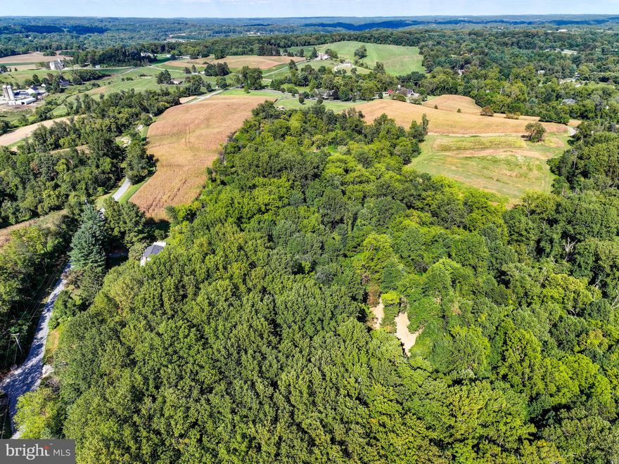 Live authentically. A zenith spot within the Western Run Valley, this exceptional 3.01-acre parcel offers a rare opportunity to bring your architectural vision to life. Proximate to the Western Run River, this property is a blank canvas ready for you to paint the next chapter in your life. Allow yourself to dream... how can the right design for you enhance your existence on planet earth? Align with an architect that understands you to create an enduring quality home with materials that reflect your distinctive style... one where nature, light and purposeful space unite in harmony. Envision the flow of daily life: frame your views, gather with intention, and relish your creation. Embrace country living while being moments to everywhere you want to be. This piece of land is magnificent. For those who cherish bird watching and nature walks... a compelling combination of rolling meadow beckoning for wildflower and pollinator plantings interspersed with vibrant healthy woodlands. Savor the autumn glow. Teeming with wildlife. No builder tie-in. The possibilities are endless. Close to Hayfields, Hunt Valley Town Center and the 83. Photos are for inspiration. Cultivate your existence. The art of uniting human and home.

Lot #16 has a well depth of 400 ft. and 3.15 gpm tested on 07/07
Lot #17 has a well depth of 112 ft. and 13.04 gpm tested on 06/07
See perc information in additional documents section