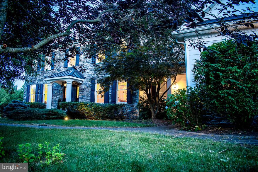 Welcome to 311 Constitution Drive, nestled in the desirable Providence Chase community. This impressive 4-bedroom, 4.5-bathroom residence, located in the renowned Spring-Ford School District, embodies the epitome of modern suburban living. Situated on a generous .72-acre lot adjacent to a neighborhood park featuring two basketball courts, a soccer field, and a playground, privacy is assured with screening trees on both sides.
The exterior of the home underwent a complete renovation in 2018, blending stone on the front facade with durable Hardie Plank on the sides and back. 36 windows (all but 2) were replaced along with all doors except the front. Enhancing the roofline, sections of steel roofing complement the shingle roof. Upon entry through the grand foyer, a sweeping hardwood staircase sets a tone. To the left of the foyer is a spacious formal living room while to the right, behind stately pillars, a large dining room provides an ideal setting for gatherings. Straight ahead, the expansive family room, with an elected five-foot bump out when the home was built, is complemented by a wet bar with custom cabinets, a convenient powder room, and an adjacent study.
The heart of the home lies beyond the family room, where the kitchen beckons with its abundant natural light, courtesy of numerous windows and a sliding glass door opening onto the expansive Trex deck. The kitchen boasts a large island, a commercial-grade 6-burner gas stove, granite countertops, built-in wall oven, and ample workspace. Completing the main floor, a second front door provides convenience, leading to the kitchen, garage, laundry room, and an additional staircase ascending to the upper level.
Upstairs, a spacious landing leads to four generously sized bedrooms, each featuring its own private full bathroom. The primary bedroom suite offers a sitting area, a luxurious bathroom with a shower, separate tub, dual vanities, and a water closet. The oversized walk-in closet accommodates extensive wardrobes and storage needs.
For future expansion or versatile use, the walk-up basement boasts high ceilings and abundant natural light, offering the potential for nearly 2,000 square feet of additional living space. Included in the sale is an 8kW generator. Join us Thursday at the first Open House or schedule your private appointment today!