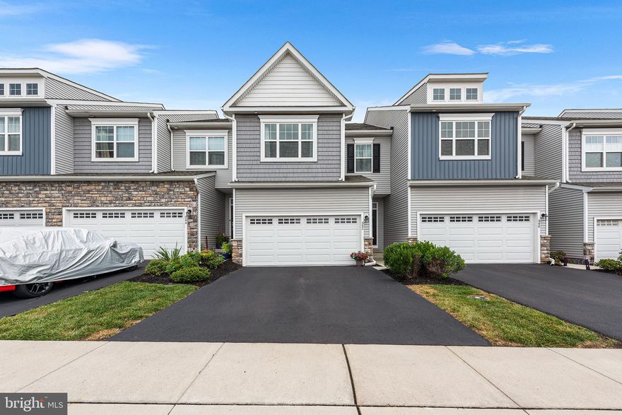 Experience luxury living in the heart of the highly desirable Enclave at Ridgewood with this move-in ready townhome that seamlessly blends upscale comfort and modern functionality. Offering over 2,500 square feet of refined living space, this stunning 3-bedroom, 2.5-bath residence welcomes you with an open-concept layout and premium finishes throughout. The chef-inspired kitchen is the centerpiece of the home, featuring granite countertops, a spacious center island, and stainless steel appliances—perfect for both casual meals and entertaining. The adjoining dining area and family room flow effortlessly, enhanced by beautiful flooring and abundant natural light. Upstairs, the expansive primary suite offers a peaceful retreat with a generous walk-in closet and a luxurious en-suite bath complete with a dual granite vanity. Step outside onto your low-maintenance deck, ideal for quiet evenings or weekend gatherings. A fully finished basement provides versatile space for a home office, gym, media room, or all three. Additional highlights include a second-floor laundry room, attached garage, ample storage, energy-efficient design, and a low-maintenance exterior. Conveniently located just minutes from Route 422, shopping, dining, and scenic walking trails, this home offers the perfect balance of luxury, location, and lifestyle. Don’t miss your lease opportunity in one of the area’s premier communities—schedule your private showing today.