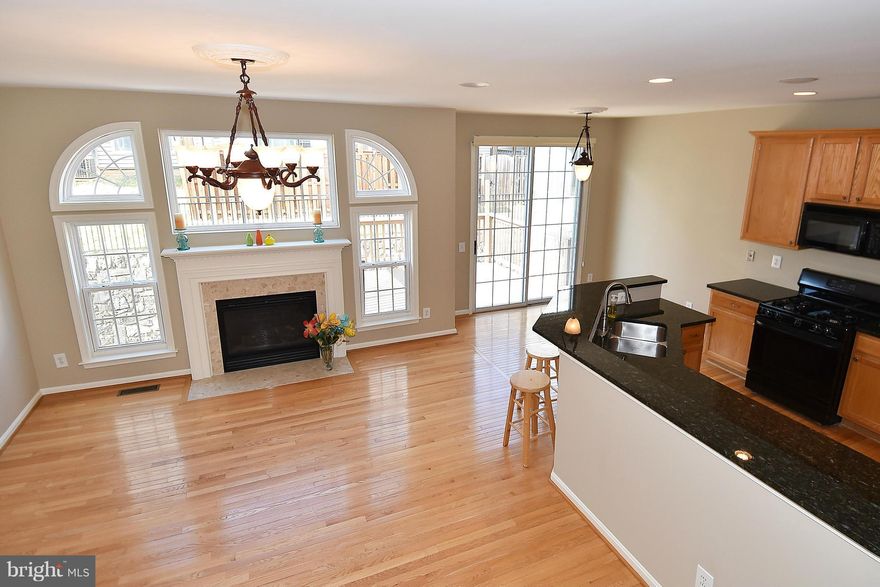 Ideal Townhouse living with expansive light filled rooms make entertaining and living a pleasure.  The open kitchen flows into the dining and living areas.  Upstairs the master suite with spa like bath is an oasis and the other 2 bedrooms are roomy with terrific closets too.  LL rec room opens to patio + 2 car garage. Freshly painted, conveniently located w/ Lake Tennis Courts & Walking Trails too