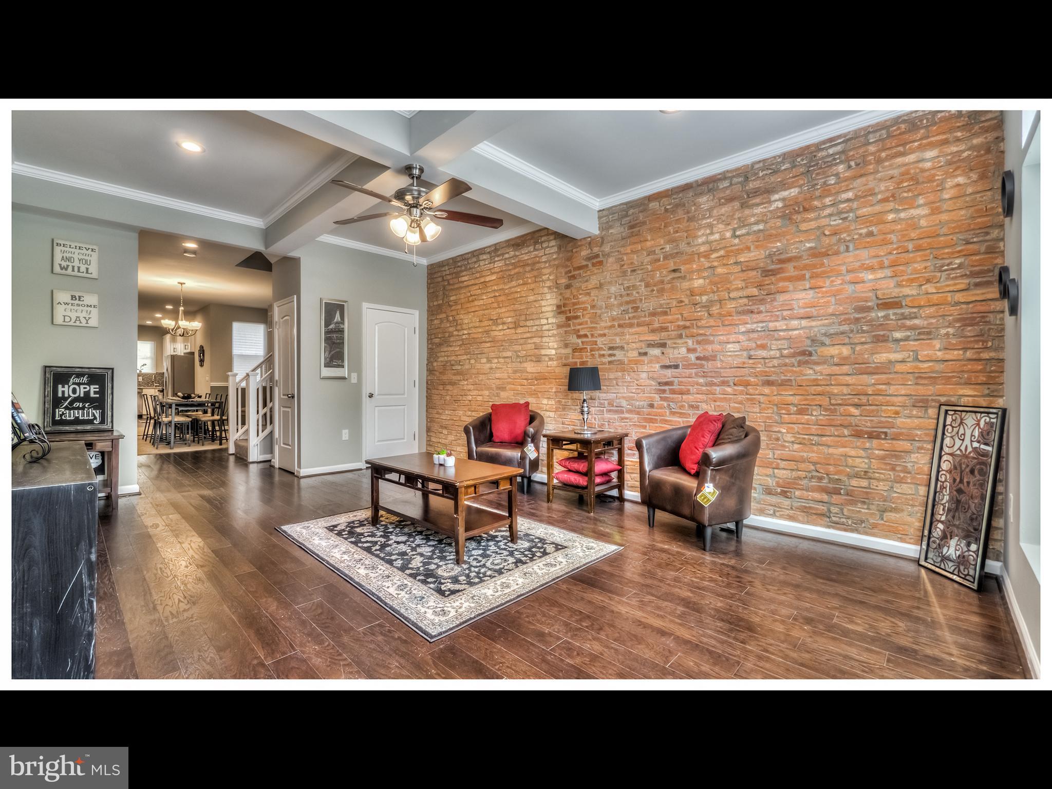 (2017 Taxes $118) Renovated 4 level Townhouse. 5 br, 3 Full Ba, 2 Half Ba w/ Exposed Brick & Trey Ceilings. 2 Master Suites, Kitchen w/ SS Appliances, 5 Burner Stove & Island w/ Granite Counter Tops. Dual Zone A/C, Large Fenced Back Yard, 2nd Fl laundry & Finished Basement. Eligible for 17K LNYW, 10K V2V Grant & Additional incentives. Near Penn Station for MARC, Amtrak, JHU Shuttle, Downtown & 95