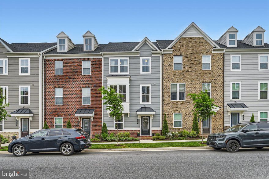 Experience refined living in this exquisite townhome boasting 3 bedrooms and 2.5 baths, meticulously designed to elevate your lifestyle at every turn.

Discover the allure of the Lower Level, positioned above grade for optimal comfort and convenience. This level offers versatile living spaces including a den/rec room, perfect for relaxation or entertainment. Revel in the abundance of storage options with three closets, one of which can easily transition into a cozy office or additional storage space. Enjoy seamless access to the attached garage, offering utmost convenience for parking and storage needs.

Step into the inviting ambiance of the Main Level, adorned with pristine hardwood floors and bathed in natural light. The gourmet kitchen is a culinary haven, featuring elegant white cabinets, granite countertops, and a spacious center island for meal preparation and casual dining. Step outside to the expansive deck, measuring 18'x12', offering picturesque views of the adjacent dog park, creating an idyllic backdrop for outdoor gatherings. Completing this level is a convenient powder room, ensuring utmost comfort for you and your guests.

Ascend to the Upper Level, where plush carpeting adds a touch of luxury to the living spaces. Retreat to the primary bedroom suite, boasting tray ceiling and a serene ambiance for rest and relaxation. Unwind in the luxurious primary bathroom, equipped with a tub/shower combination and ample vanity space. Two additional bedrooms, with ample storage for your wardrobe essentials. The convenience of a washer/dryer on this level ensures effortless laundry days. Stay cool and comfortable year-round with ceiling fans in all bedrooms.

Embrace a lifestyle of unparalleled comfort and sophistication at Greenleigh, where modern amenities and suburban charm converge seamlessly. Don't miss the opportunity to make this meticulously crafted townhome your own and experience the epitome of luxury living in the coveted Greenleigh community.