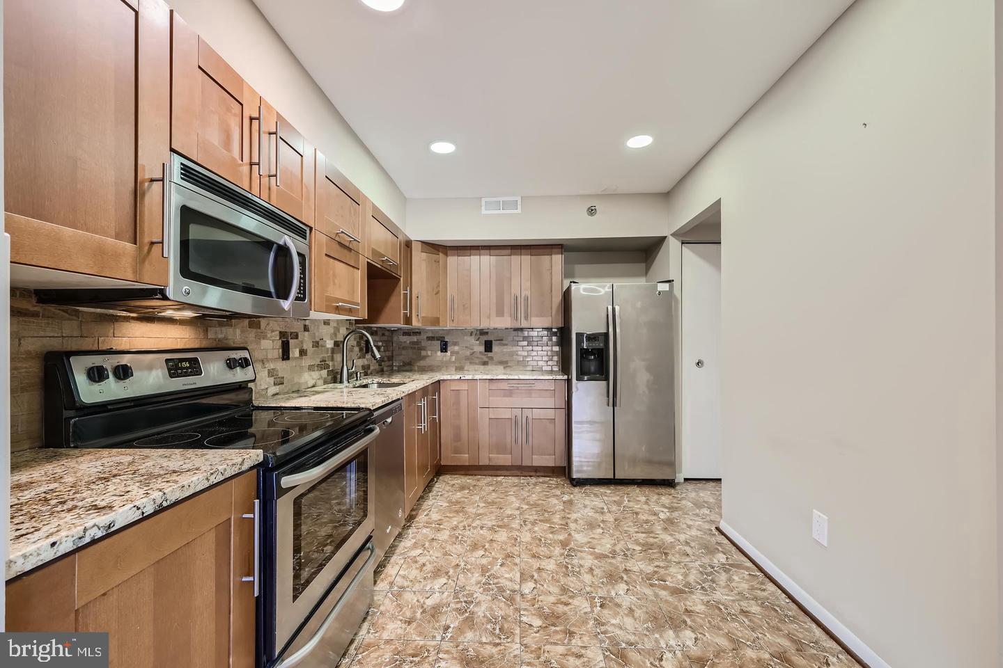 Rarely available updated 2BR/2BA penthouse condo in sought-after Greengate! Enjoy the peace and privacy of top-floor living with no neighbors above you, all in a secure elevator building. Bright and spacious layout with updated eat-in kitchen featuring granite countertops, modern flooring, and a large living room that opens to your own private balcony. Two generous bedrooms, two full baths, and ample closet space. Extra storage and a party room in the building, plus assigned parking.
Unbeatable location — minutes to Quarry Lake for Starbucks, dining, shops, and scenic walking paths. Quick access to I-695 and I-83 for an easy commute, with groceries, pharmacy, and medical offices nearby. Quiet dead-end street offers added privacy. No pets!