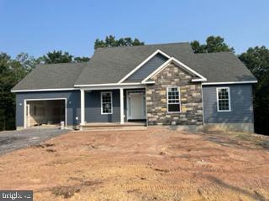 Under construction! This 3 bedroom 2 bath ranch style home with a full basement will soon be ready to move in! It features hardwood floors, carpet, granite countertop, tiled shower in primary bath and more! Nice large lot. A must to see! Call today for a showing!