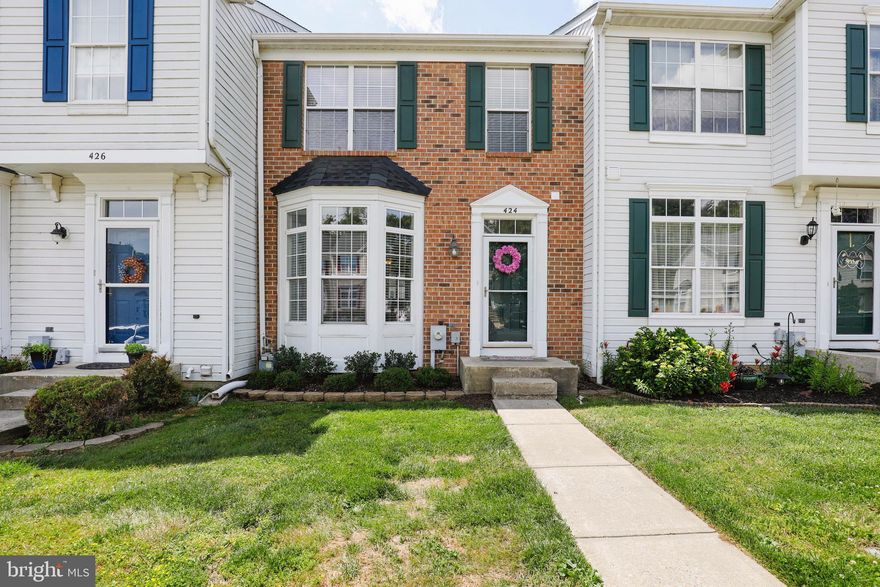 Beautiful brick front town home in Country Walk, close to all the shopping and restaurants that BelAir has to offer!  Gleaming Brazilian cherry hardwood floors in the living/dining room lead to a large eat in kitchen.  Equipped with granite counters, stainless appliances and nice island.  Large sliders lead from the kitchen to the large deck with steps to the fully fenced in yard.  The open stairwell leads upstairs to three nice bedrooms and 2 full bathrooms.  The master bedroom has vaulted ceilings with two sky lights, a walk in closet, and beautifully updated en-suite.  The basement has a large family room with a gas fireplace to cozy up in front of on nippy winter days.  There is also a full bathroom, laundry room and bonus room that could be an office, exercise or guest room.  This home has so much to offer!  Roof is only a few years young and this home has been well taken care of!