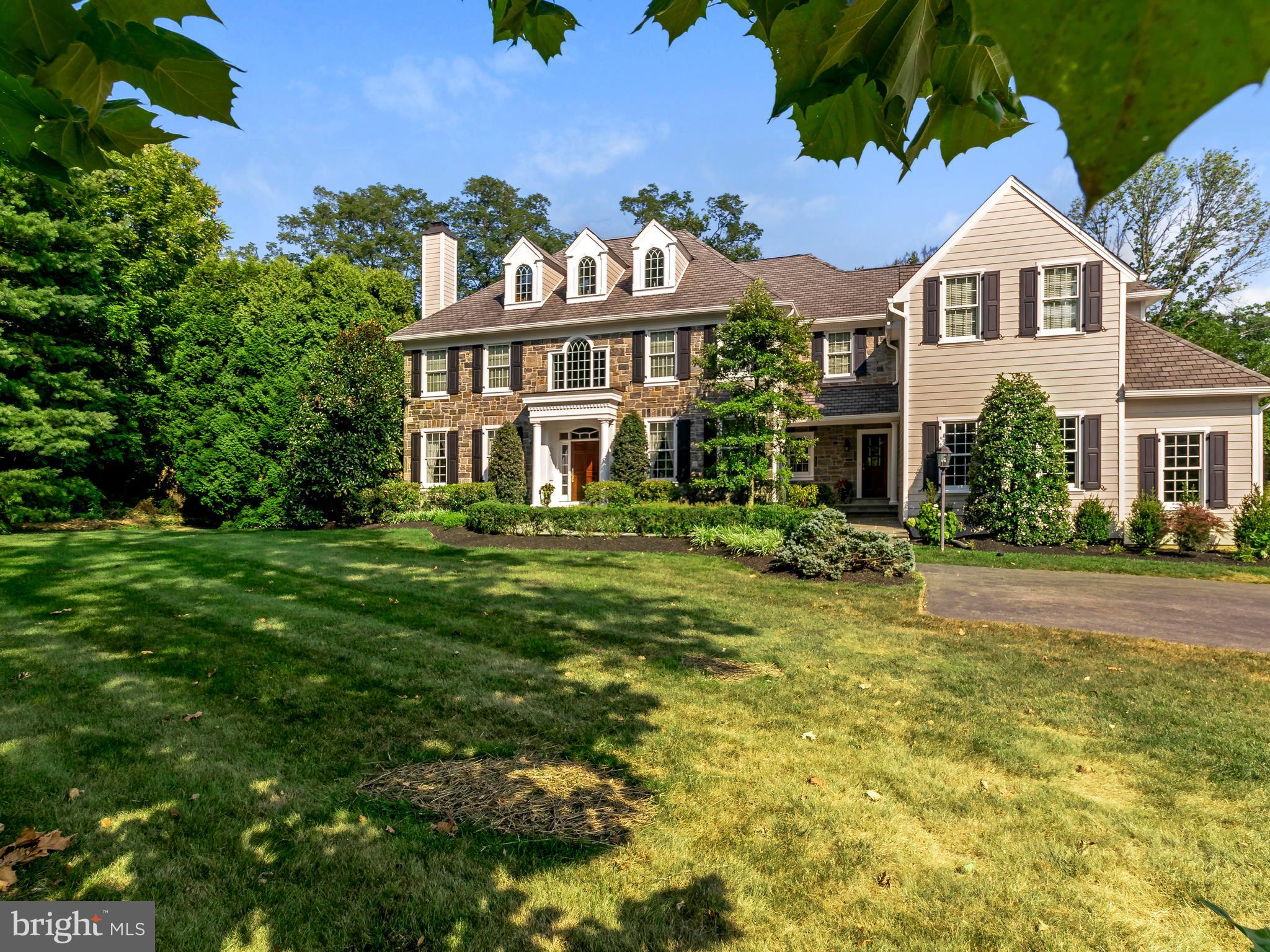 Location, location. First time on the market! This custom stone and hardi plank home has spectacular conveniences; adjacent to the Radnor trail, a stone's throw from downtown Wayne & easy access to Blue Route! This well maintained home has a bright open floor plan & comes with countless features starting with the custom finishes, the simple level lot entered through the stone pillars, the cathedral ceilings with southern exposure that allows for an open bright naturally lit great room which is adjacent to the chef's kitchen, fine wood sewn custom cabinetry & built-ins, in place finished hardwood floors and the center hall foyer just to name a few highlights. With a flow for entertaining, as you enter the front door the home stuns in the entrance hall with the Romeo & Juliet staircase balcony. The living room space with the centering marble fireplace and French overflow doors lead into the expanded office/study is directly across from the formal dining area for a great flow when need be. To the rear of the center hall foyer there is an open staircase to the lower level leading you to finished walk out basement complete with a bar/kitchen, full bathroom and adjacent equipped laundry room with cubbies giving a cabana like qualities which services the outdoor pool that sits just beyond the French exterior doors. The lower level is also home to the large mirrored workout room as well as storage space. When using the front side entrance, you are leaded to the bright family spaces including a desk and cubbies, as well as an open back staircase. This magnificent oversized great room with its gas fireplace, custom cabinetry and a wall of windows overlooking rear yard which backs up to Kintera Lane, is also the location of the private pool and one of only a handful of homes that is adjacent to the Radnor Trail! The large well-equipped gourmet kitchen compete with a wolf cooktop, subzero, 2 dacor ovens and a custom large block granite island with wine cooler is not to be missed! The cabinetry is hand crafted complete with service areas, bookcases thus tying both rooms together as one. The morning sunroom is perfect for that cup of tea or coffee and the morning news feed. If the day is gorgeous just exit through the French doors to the flagstone patio overlooking the private yard and pool with a great novel! The second level allows for a large master bedroom suite with sitting room, dressing area with 2 walk-in closets and spacious master bathroom with shower system and tub. As you travel across the open staircase you will step down a stair and be greeted by the second bedroom has a walk-in closet and private bathroom that was recently updated. Bedrooms 3 and 4 share an updated hall bath and have ample spaced closets to house your best dressed! The hallway laundry is built in and houses the washer and gas dryer. The final bedroom on the floor has an en suite bathroom and is near the open staircase to the Third floor space that is finished with a bedroom, full bath and storage area, perfect for the au pair, parent or visiting guest! Come look at this little big house and all it has to offer, you will be amazed.