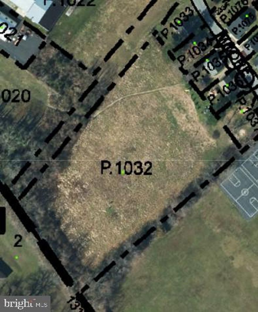 2.14 Cleared Acres- Possibility of 24 Potential Multi-Family Units allowed. (2) Road entrances.  Survey on File.