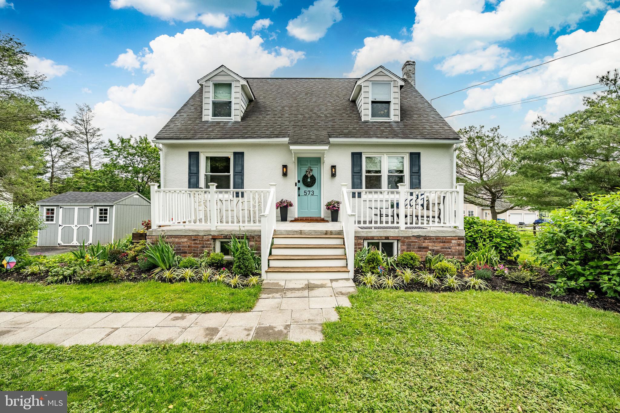 Welcome to 573 Schoolhouse Road, a beautifully updated cottage in the heart of Kennett Square. Brimming with charm and thoughtfully renovated for today’s lifestyle, this turnkey home blends timeless character with modern convenience.
Step inside to light-filled living spaces featuring refinished oak hardwood floors throughout (2019), crisp finishes, and classic details. The open-concept kitchen boasts marble countertops, quality cabinetry, and stainless steel appliances. A dry bar with wine fridge and soapstone countertops, make entertaining effortless. The cozy living room is anchored by a gas fireplace (2020), built-in shelving, and custom lighting.
The expansive primary bedroom offers a peaceful retreat, while the updated bath features radiant heated floors, stylish tilework, and contemporary fixtures. A bonus room with pantry storage adds flexibility and function. Major upgrades include new plumbing and electrical (2019), a new driveway (2024), and a new roof (2025).
Outside, enjoy sunrise views from the front porch over the neighboring farm, and sunset views from the expansive wraparound deck and wide-open backyard—perfect for summer BBQs. The English garden thrives with anything you plant, and the local farm stand just down the road offers fresh eggs and produce. As a hidden bonus, you’ll enjoy Longwood Gardens fireworks views all summer long.
With its storybook setting and thoughtful renovations, 573 Schoolhouse Road is a rare find—timeless, fresh, and ready to welcome you home.