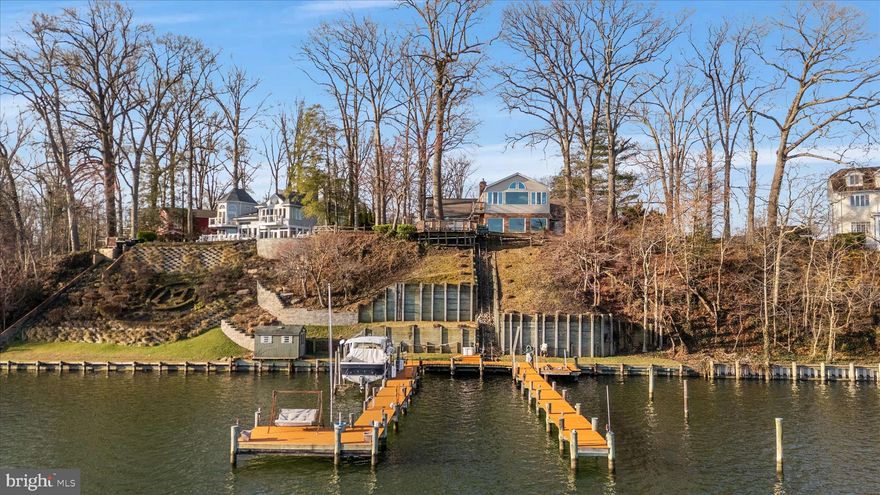 Waterfront Living at Its Finest in Edgewater Beach!

Welcome to this exceptional waterfront home located in the sought-after community of Edgewater Beach. Perfectly positioned along the South River, this property offers breathtaking panoramic water views and the ultimate Chesapeake Bay lifestyle.

Designed with flexibility in mind, this spacious home features 5 bedrooms and 4.5 bathrooms, including two main-level bedrooms with en suite baths—ideal for convenient one-level living or accommodating guests. One of these main‑floor bedrooms opens directly onto a private waterfront patio, creating a serene indoor‑outdoor retreat.

The expansive family room is filled with natural light and showcases stunning water views along with a cozy gas fireplace, creating the perfect space to relax or entertain. At the heart of the home, the large kitchen offers abundant space, a double pantry, and endless potential to customize and create your dream culinary space.  A centrally located office/bonus room adds a quiet, light‑filled workspace complemented by a calming water view.

Upstairs, the impressive primary suite is a true retreat, featuring an en suite bath, pellet stove, private exterior entrance, and incredible sunrise and sunset views through numerous windows. Two additional upper‑level bedrooms with an adjoining  balcony offer elevated vantage points to enjoy the surrounding beauty. A full bath completes the upper level.

Step outside onto the patio & deck overlooking the river—perfect for morning coffee or evening gatherings. A tram provides easy access down to the waterfront, where you’ll find two expansive 85-foot piers with deep water slips and three boat lifts, making this property a boater’s dream.

Additional features include a detached two‑car garage, whole‑house generator, Pella windows, and a fully fenced yard—everything you need to enjoy effortless waterfront living.

This is a rare opportunity to own a premier South River property with unmatched views, space, and potential.