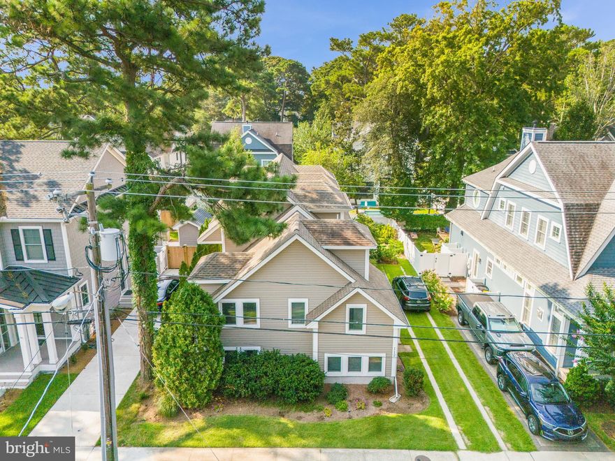 Discover the ultimate beach lifestyle in this stunning 6-bedroom, 6.5-bathroom coastal home, ideally situated on one of the best streets in South Rehoboth and  just 1.5 blocks from the boardwalk and beach. This spacious 3 level residence offers the perfect blend of luxury and comfort, making it an ideal retreat for large families or those who love to entertain. Step inside to find a beautifully updated kitchen featuring top-of-the-line appliances, elegant countertops, large island and ample cabinetry, making meal preparation a breeze. The open-concept design flows seamlessly into the living /dining areas,  plus sunroom creating a welcoming space for gatherings or relaxation. Each of the six  bedrooms is a private oasis, complete with en-suite bathrooms, ensuring comfort and privacy for all. Outside, you'll find a spacious deck perfect for dining al fresco or unwinding after a long beach day. With its prime location, updated amenities, and ample space, this home is a rare find in South Rehoboth Beach and would be ideal as a  full time, 2nd home or investment property.  Building foot print and square footage cannot be duplicated with today's current building codes.  Don’t miss the opportunity to own your dream coastal retreat!