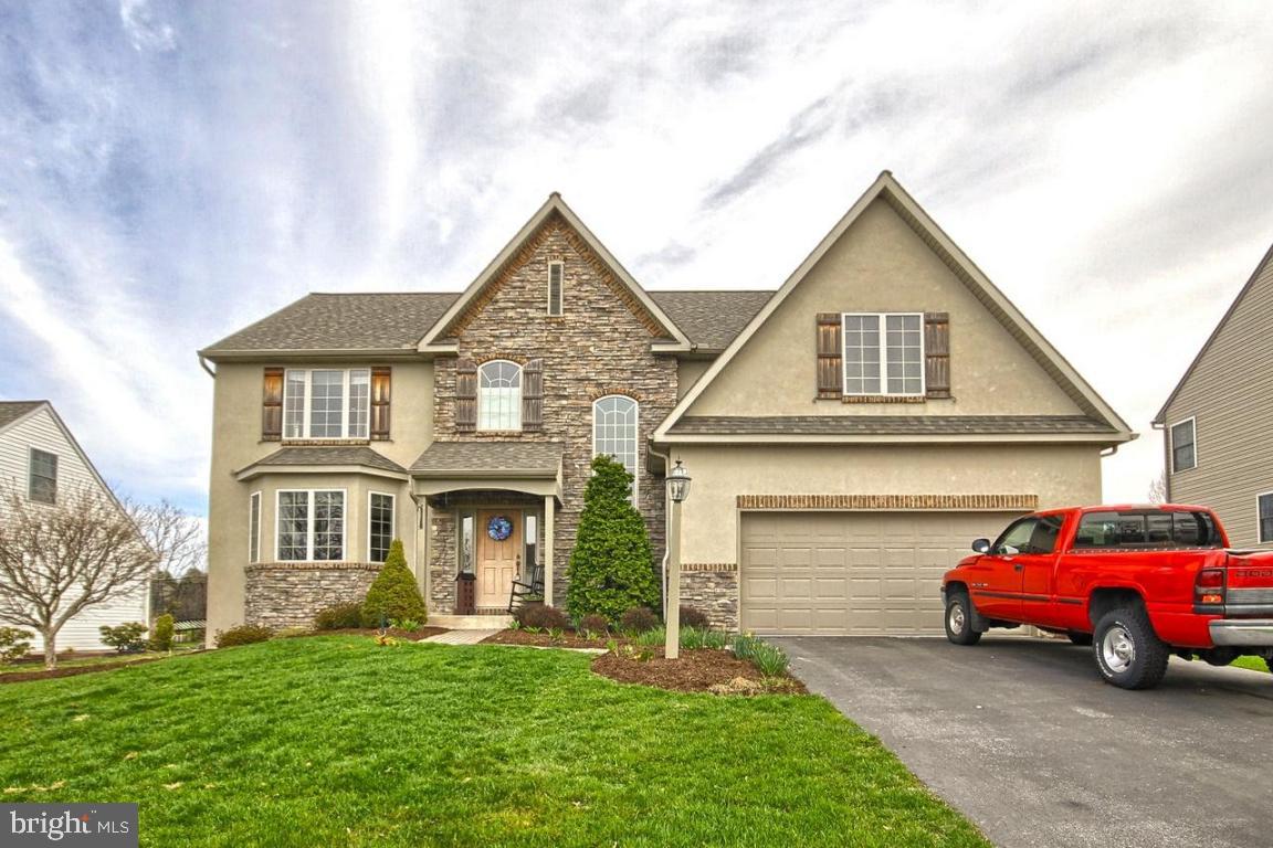 This beautiful 4 BR, 3.5 BA two-story is sure to please. It's spacious rooms throughout offer many upgrades including a home security system. The lower level man-cave is a sports fan's dream equipped with a bar, gas fireplace, and full bath. The in-ground pool will give you hours of fun in the sun! Schedule your showing today - you'll be glad you did!